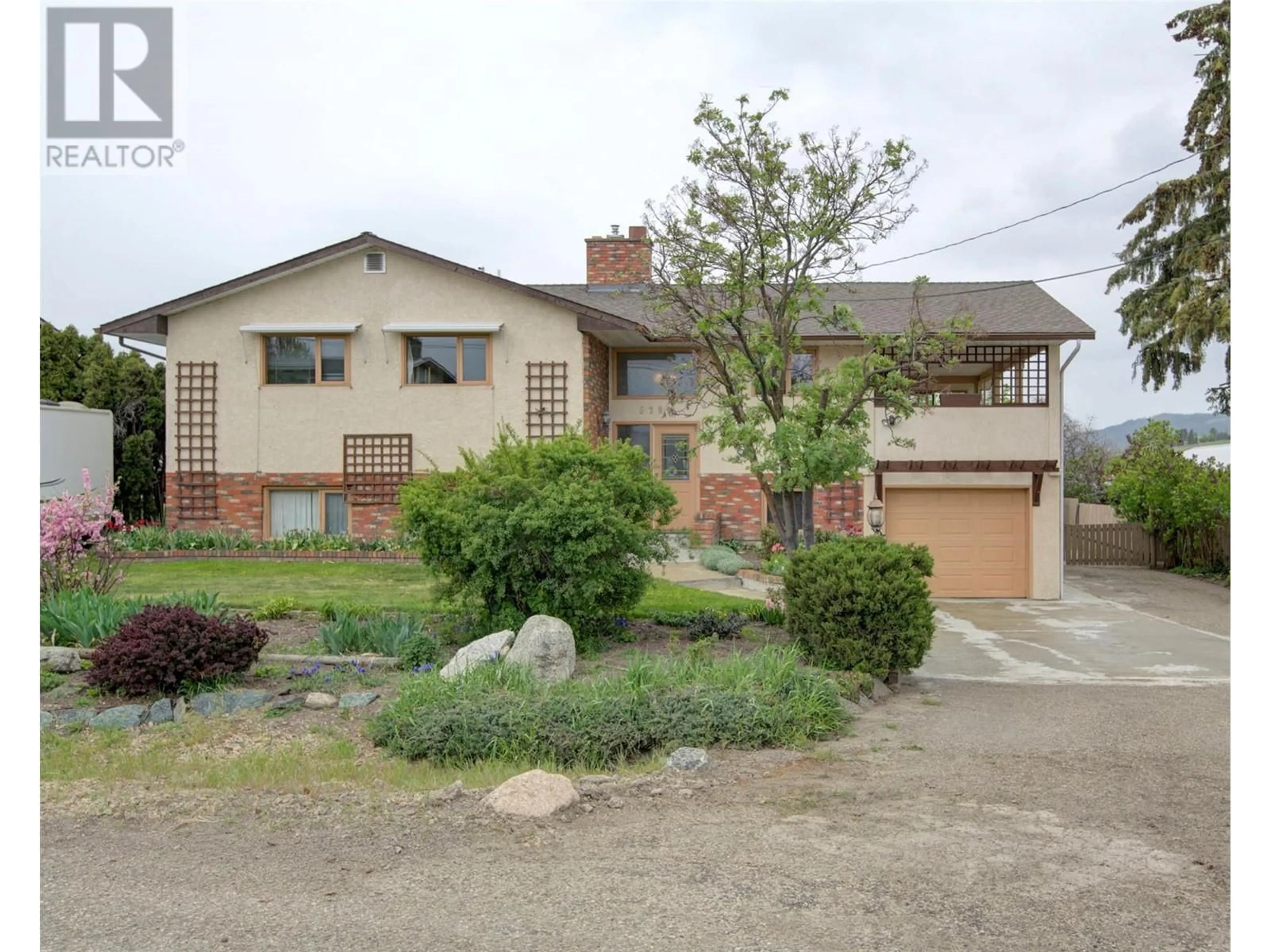 A pic from outside/outdoor area/front of a property/back of a property/a pic from drone, street for 5381 SPARTAN ROAD, Vernon British Columbia V1B3K9