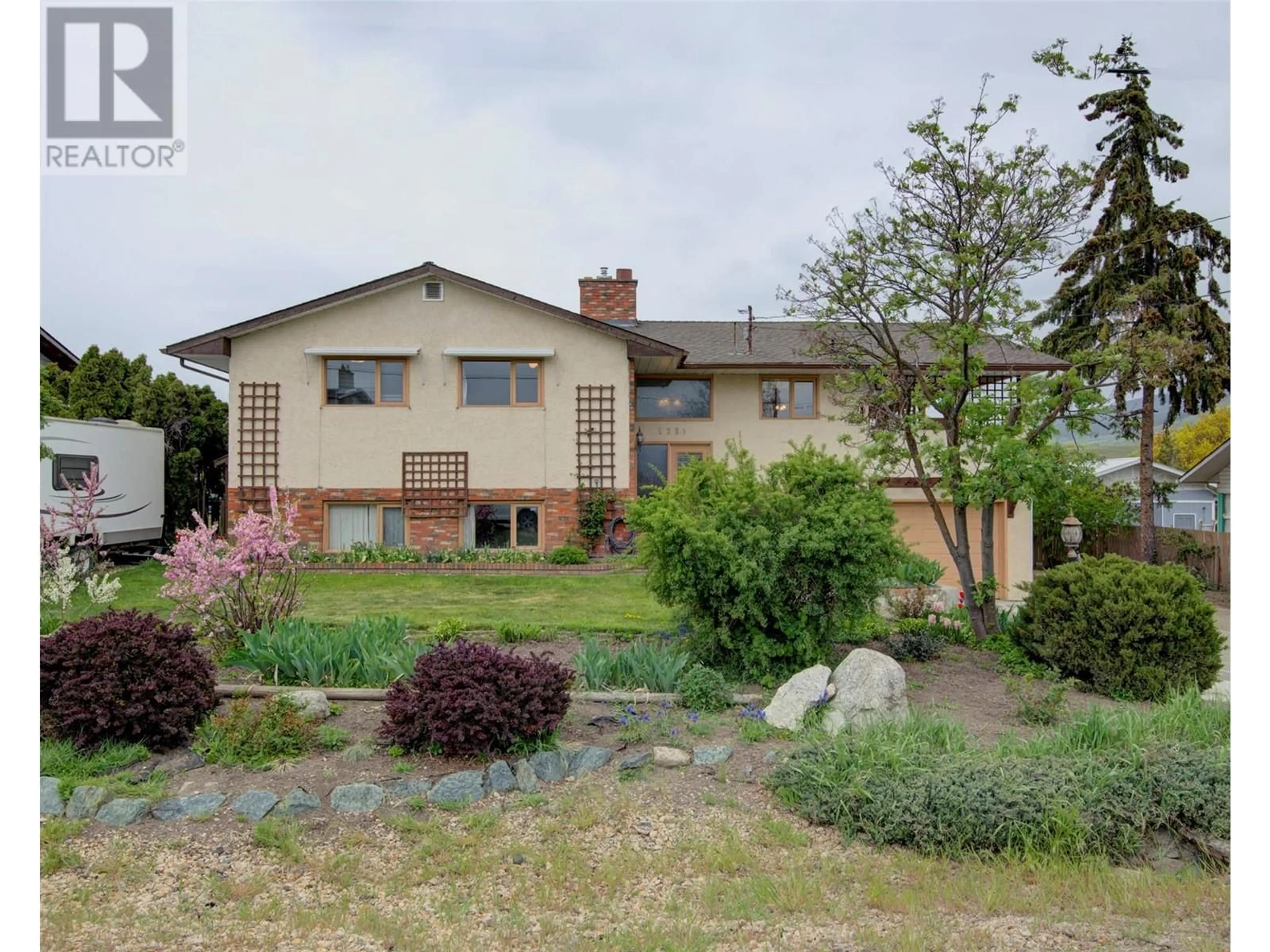 A pic from outside/outdoor area/front of a property/back of a property/a pic from drone, street for 5381 SPARTAN ROAD, Vernon British Columbia V1B3K9