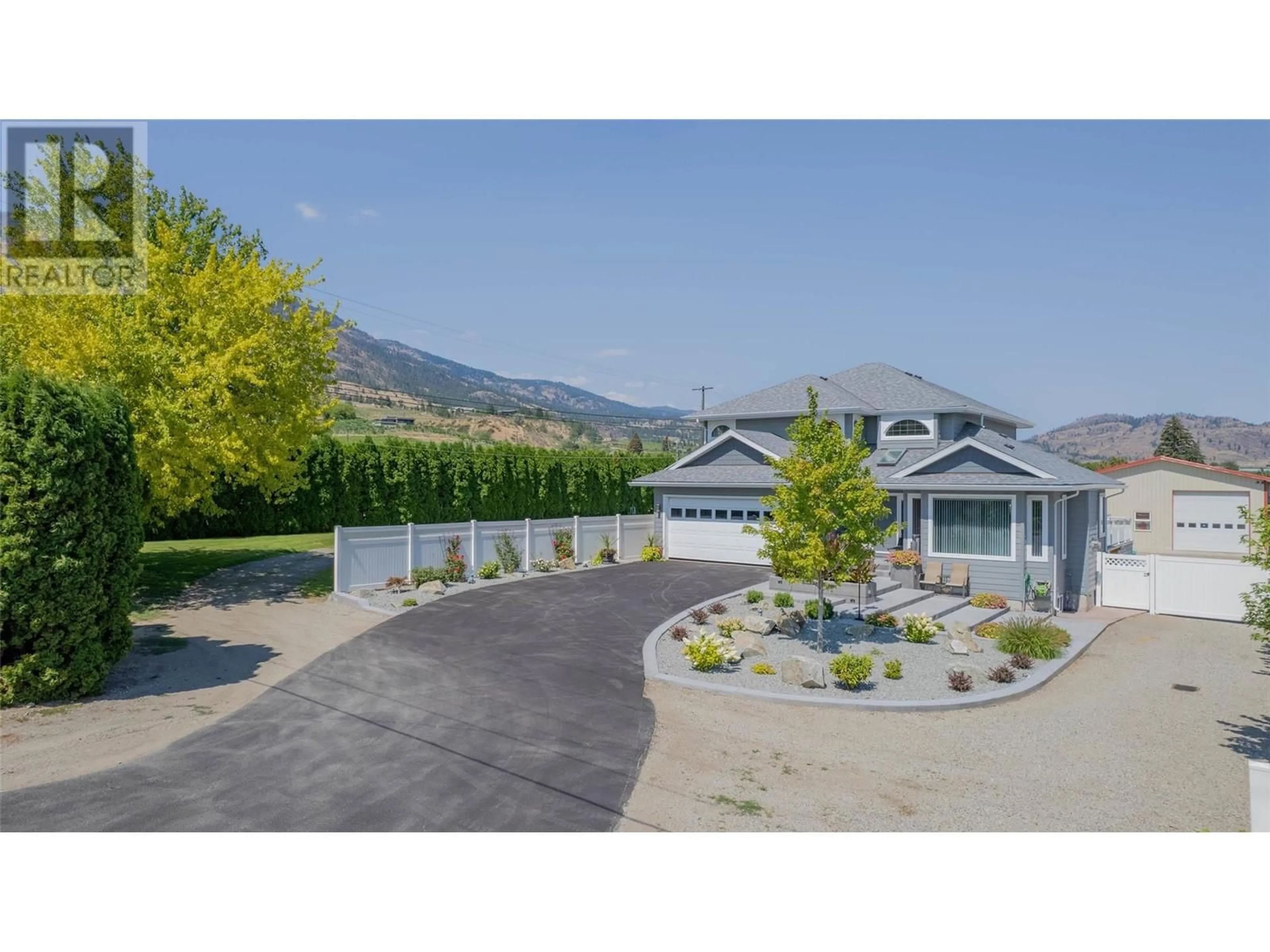 A pic from outside/outdoor area/front of a property/back of a property/a pic from drone, mountain view for 388 ROAD 10 OTHER, Oliver British Columbia V0H1T1