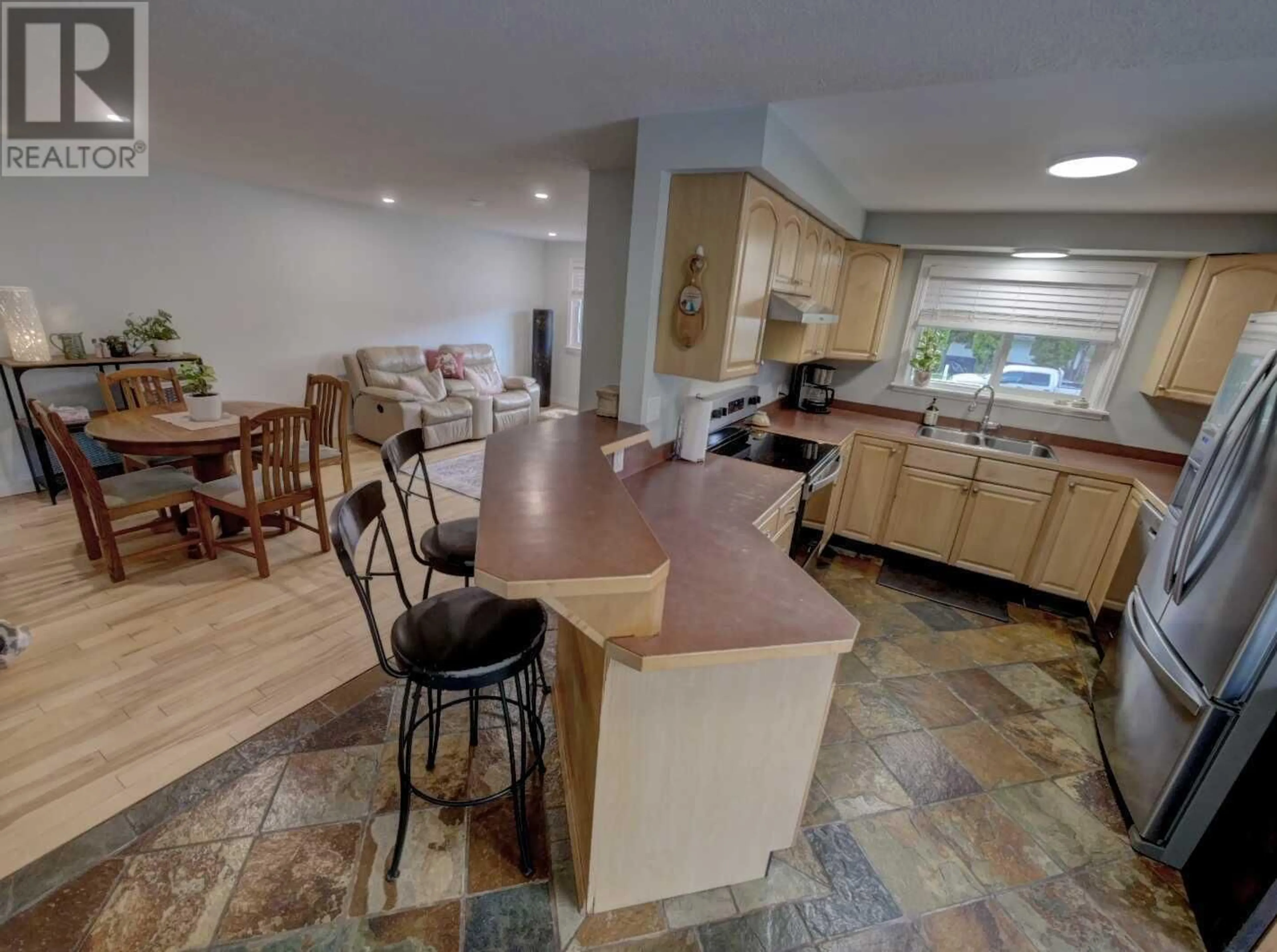 Open concept kitchen, ceramic/tile floor for 922 COLUMBIA CRESCENT, Nakusp British Columbia V0G1R0
