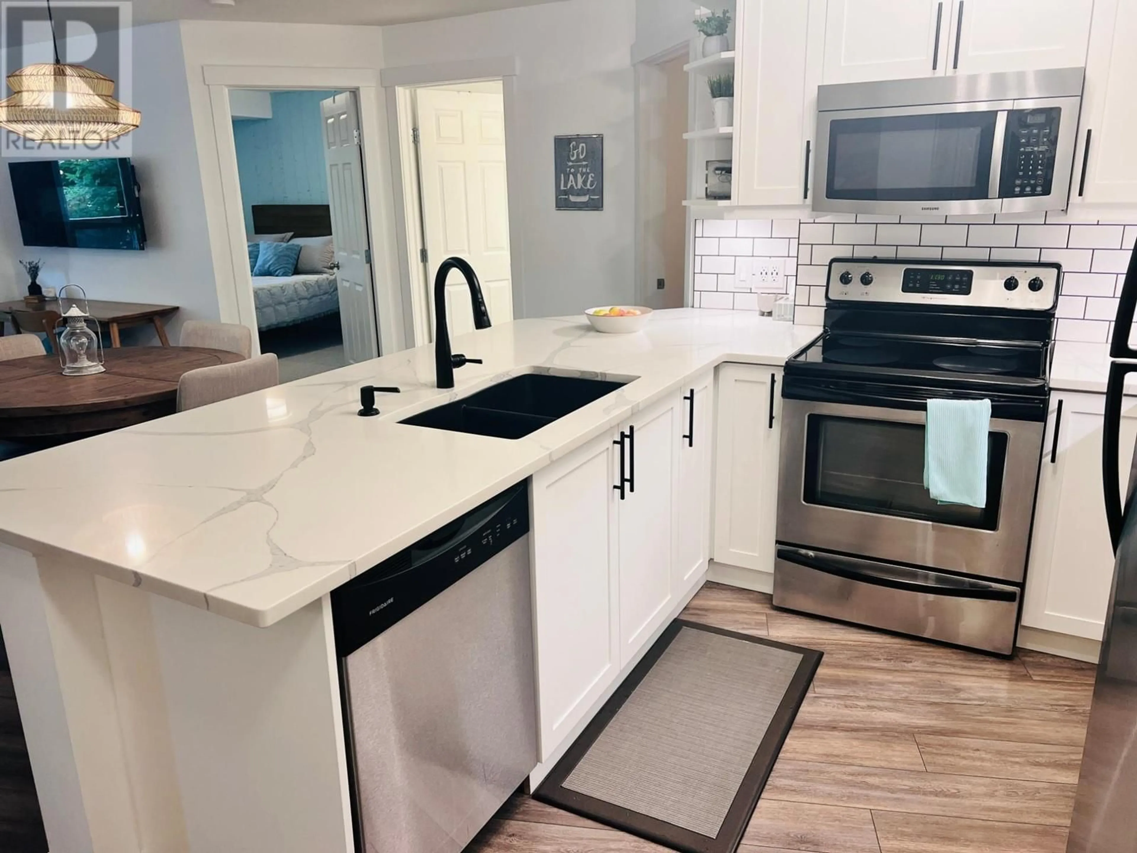 Open concept kitchen, ceramic/tile floor for 2217 - 205 THIRD AVENUE, Invermere British Columbia V0A1K7