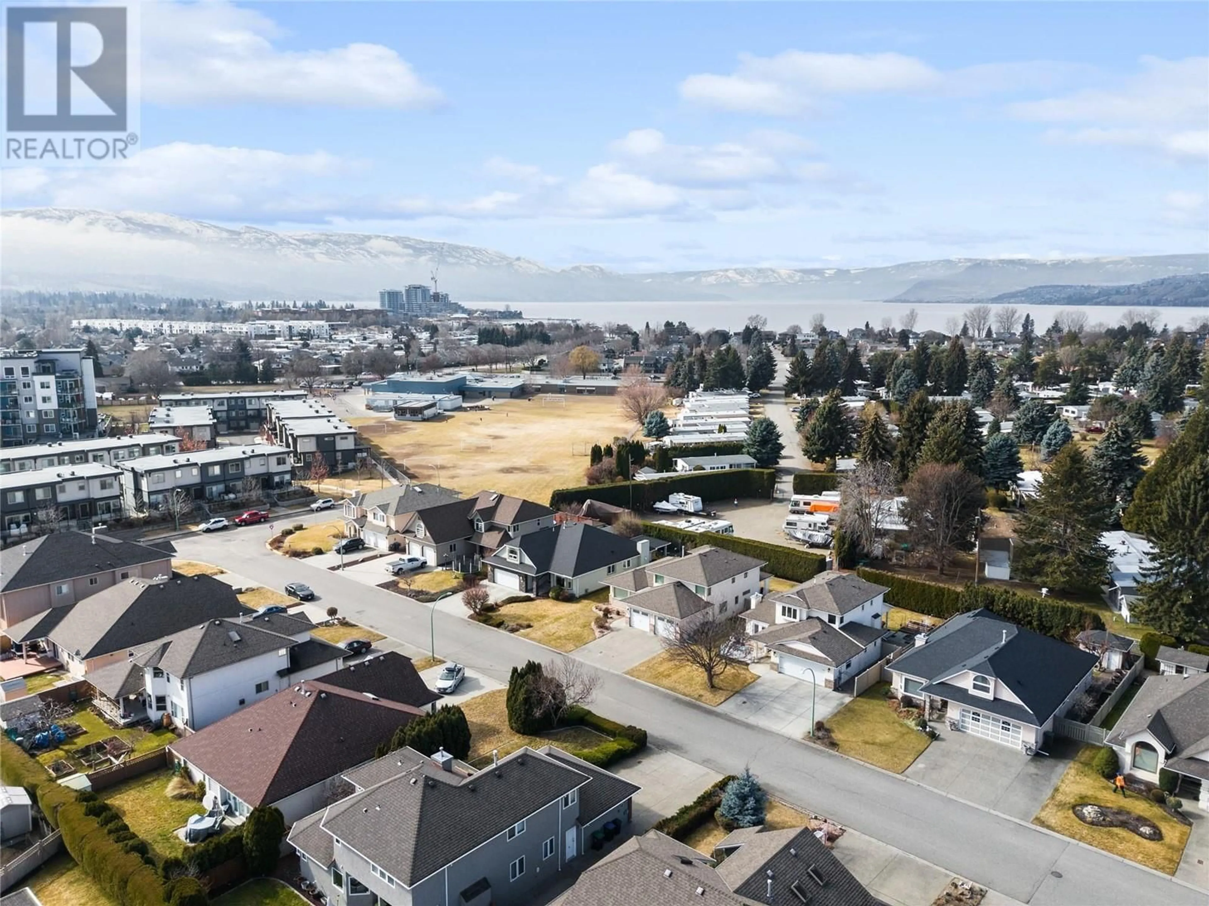 A pic from outside/outdoor area/front of a property/back of a property/a pic from drone, mountain view for 3556 ATHALMER ROAD, Kelowna British Columbia V1W3Y5