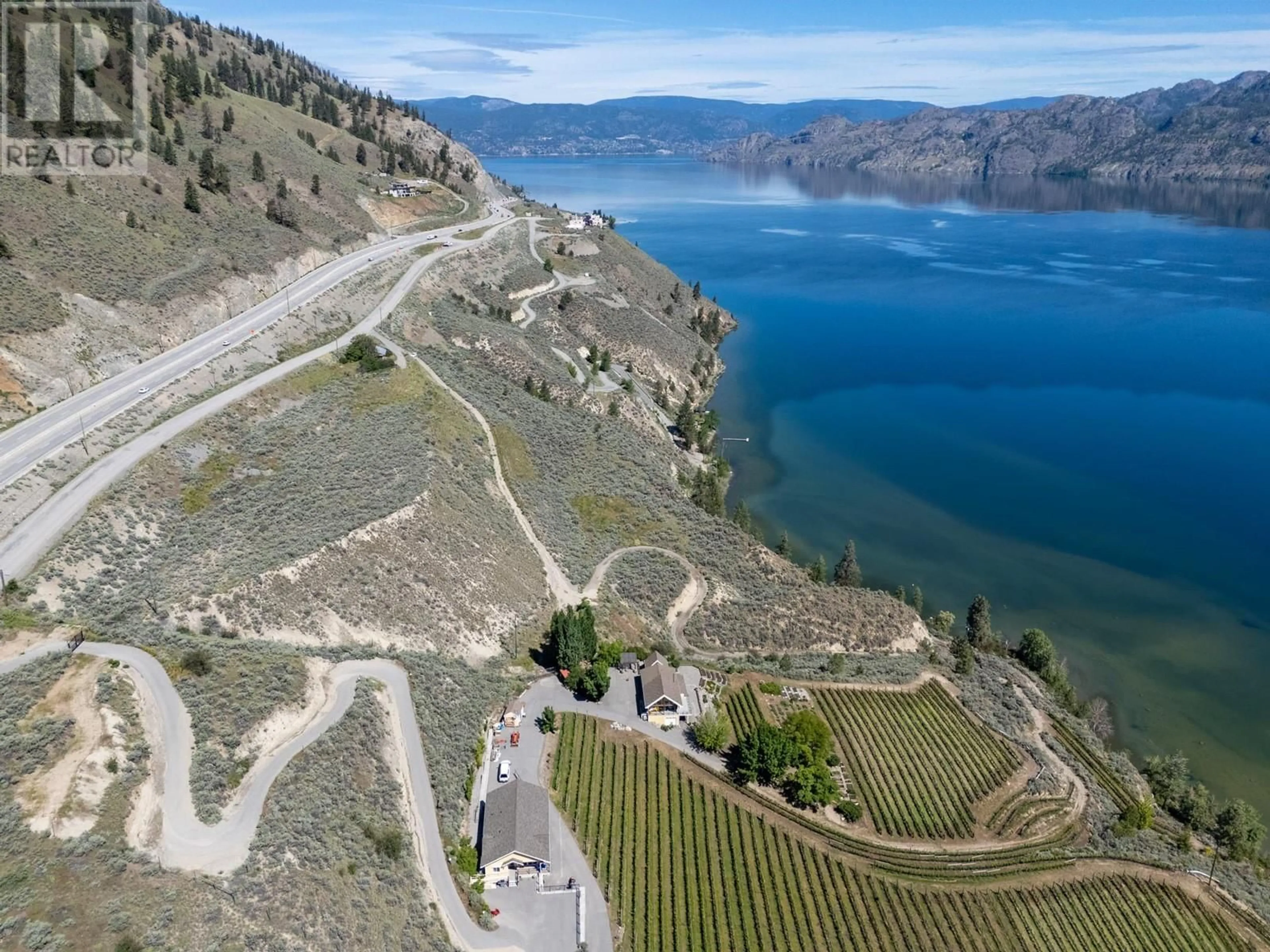 A pic from outside/outdoor area/front of a property/back of a property/a pic from drone, water/lake/river/ocean view for 351 CALLAN ROAD, Summerland British Columbia V0H1Z6