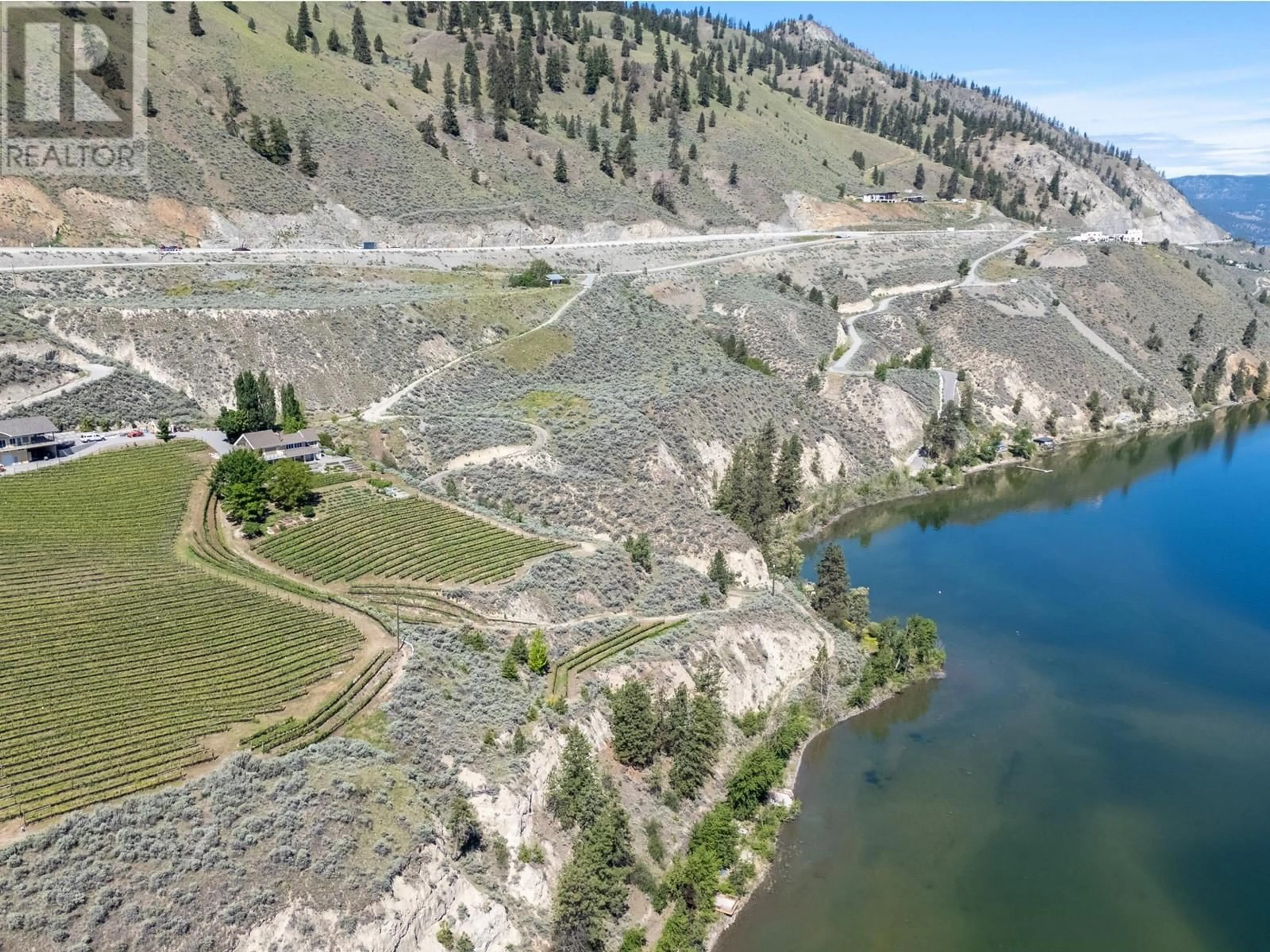 A pic from outside/outdoor area/front of a property/back of a property/a pic from drone, water/lake/river/ocean view for 351 CALLAN ROAD, Summerland British Columbia V0H1Z6