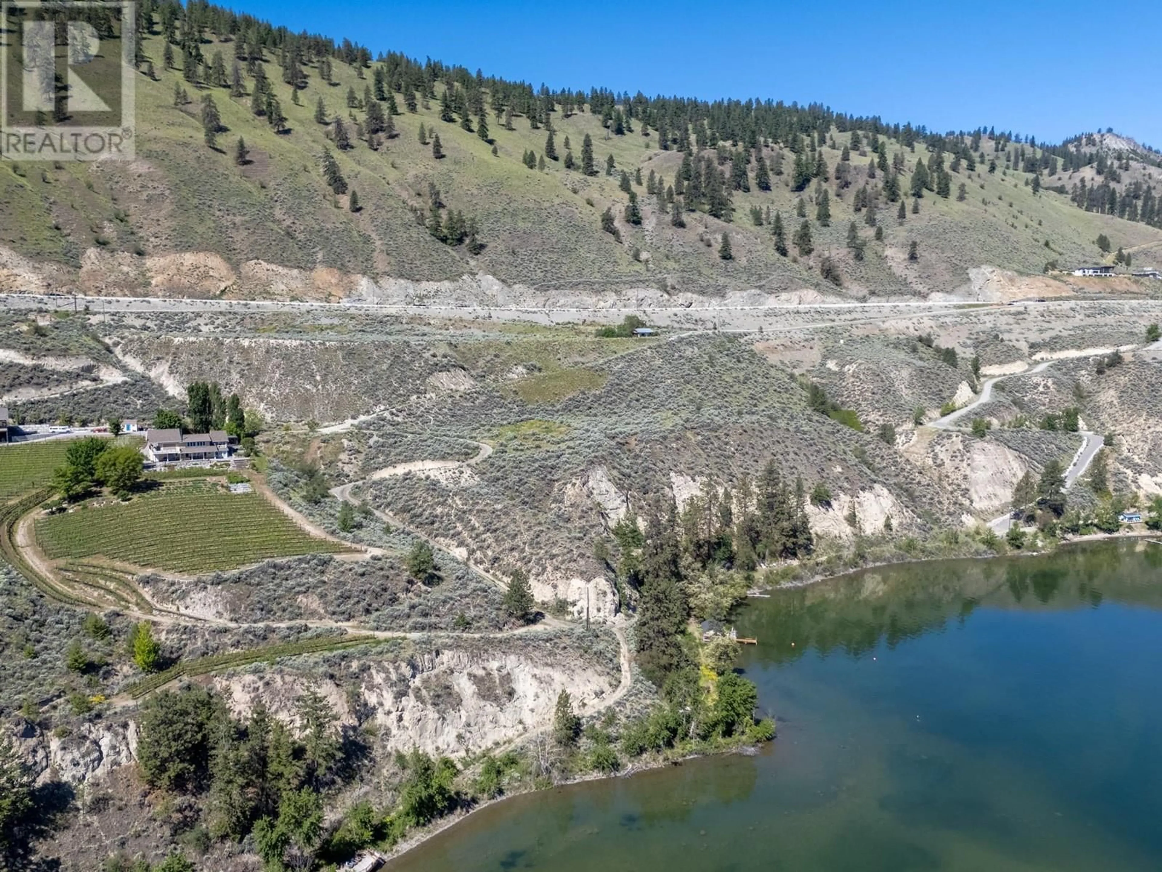 A pic from outside/outdoor area/front of a property/back of a property/a pic from drone, water/lake/river/ocean view for 351 CALLAN ROAD, Summerland British Columbia V0H1Z6