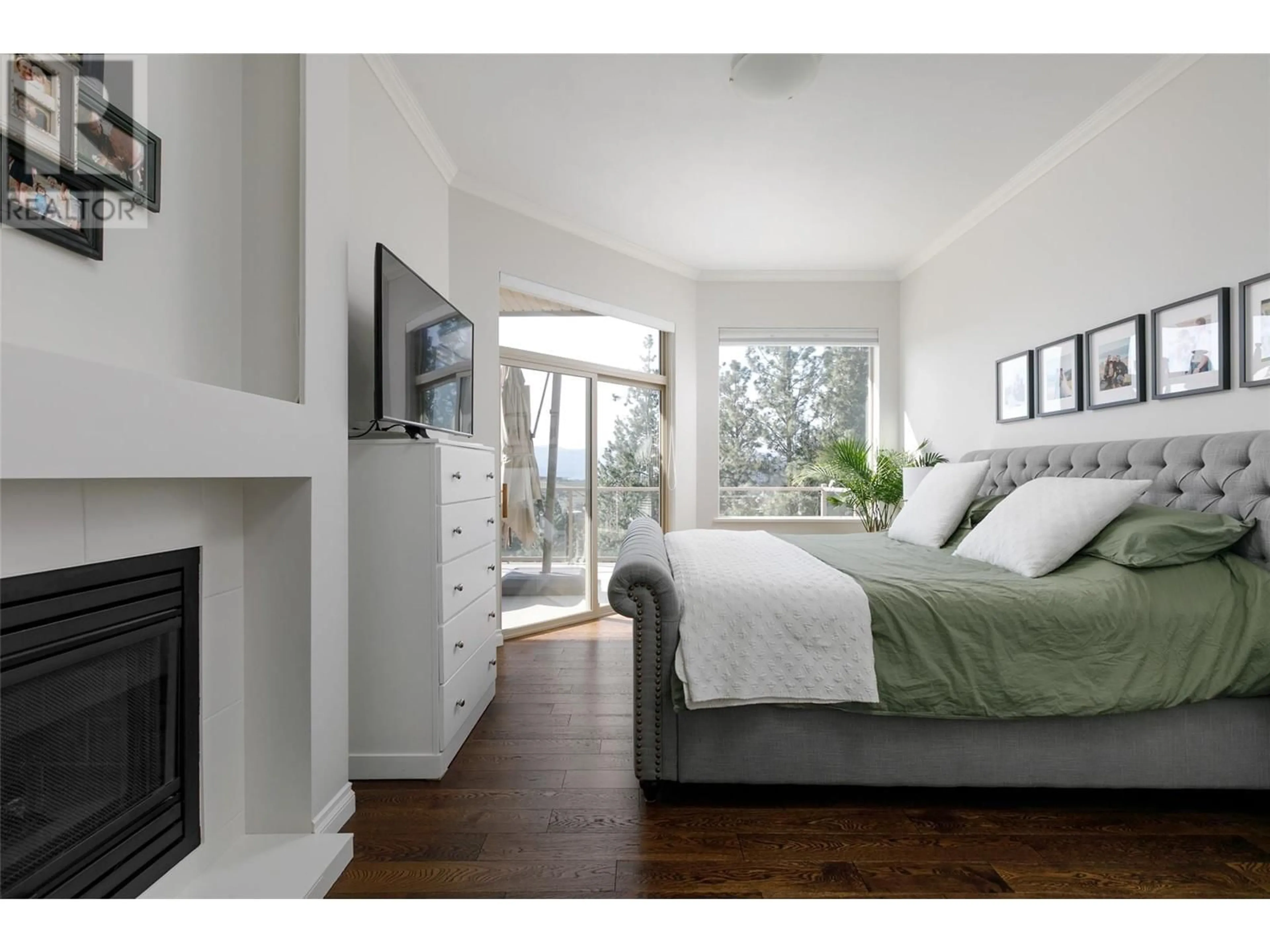 Bedroom with bed, wood/laminate floor for 2053 MOONBEAM CLOSE, West Kelowna British Columbia V1Z3X8