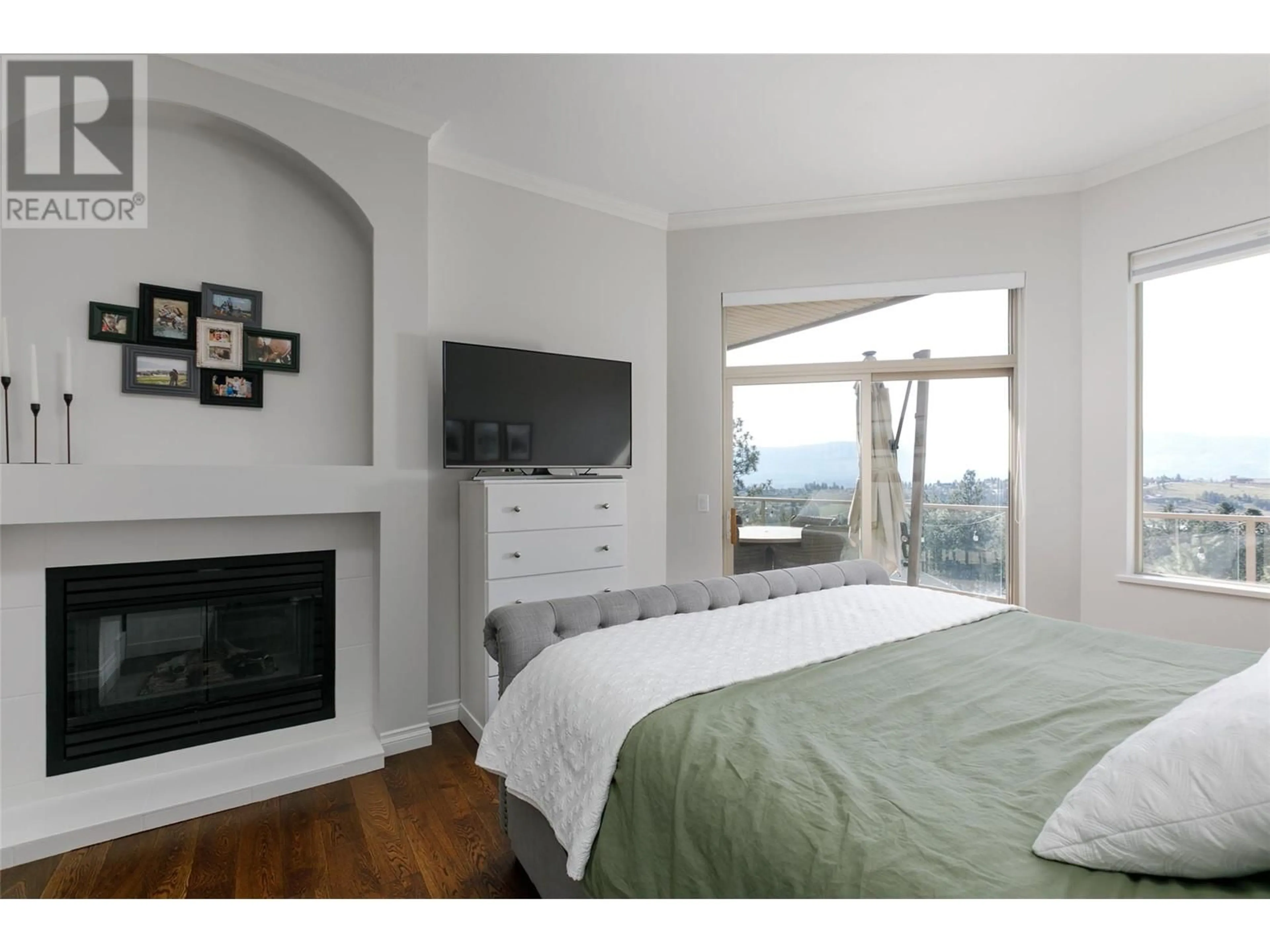 Bedroom with bed, wood/laminate floor for 2053 MOONBEAM CLOSE, West Kelowna British Columbia V1Z3X8