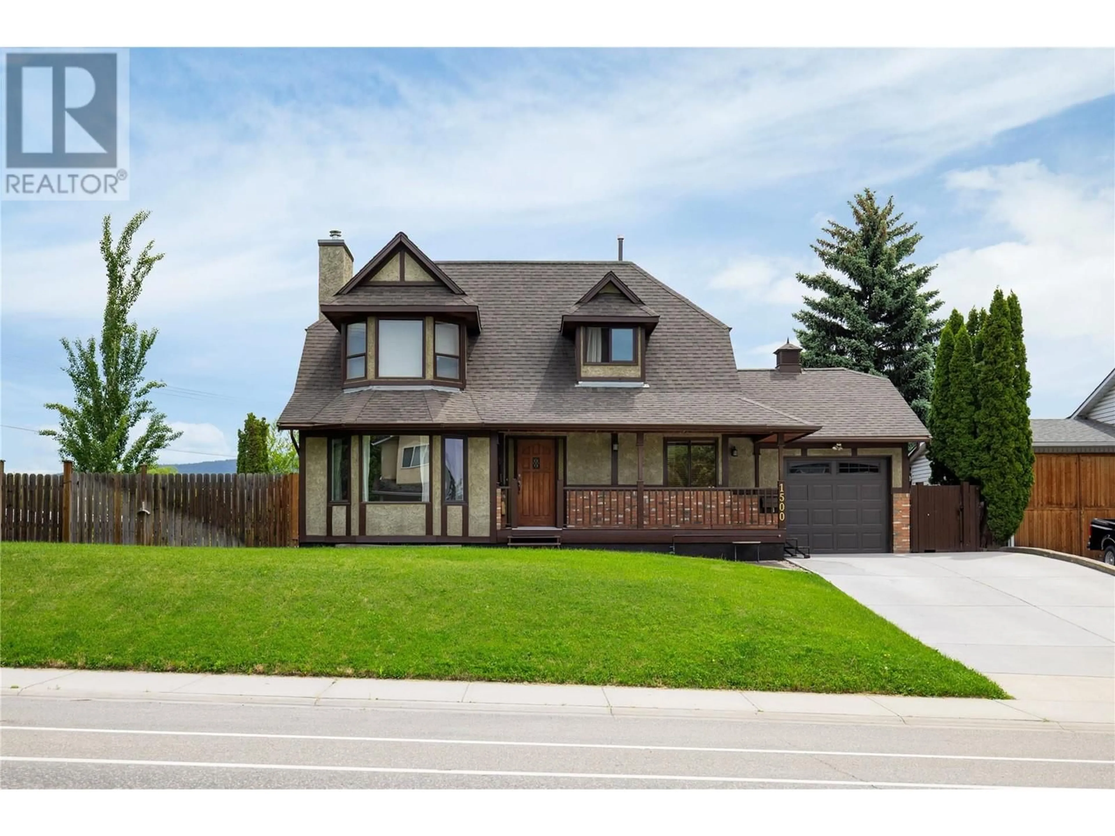 Home with brick exterior material, street for 1500 POTTERY ROAD, Vernon British Columbia V1T8M1