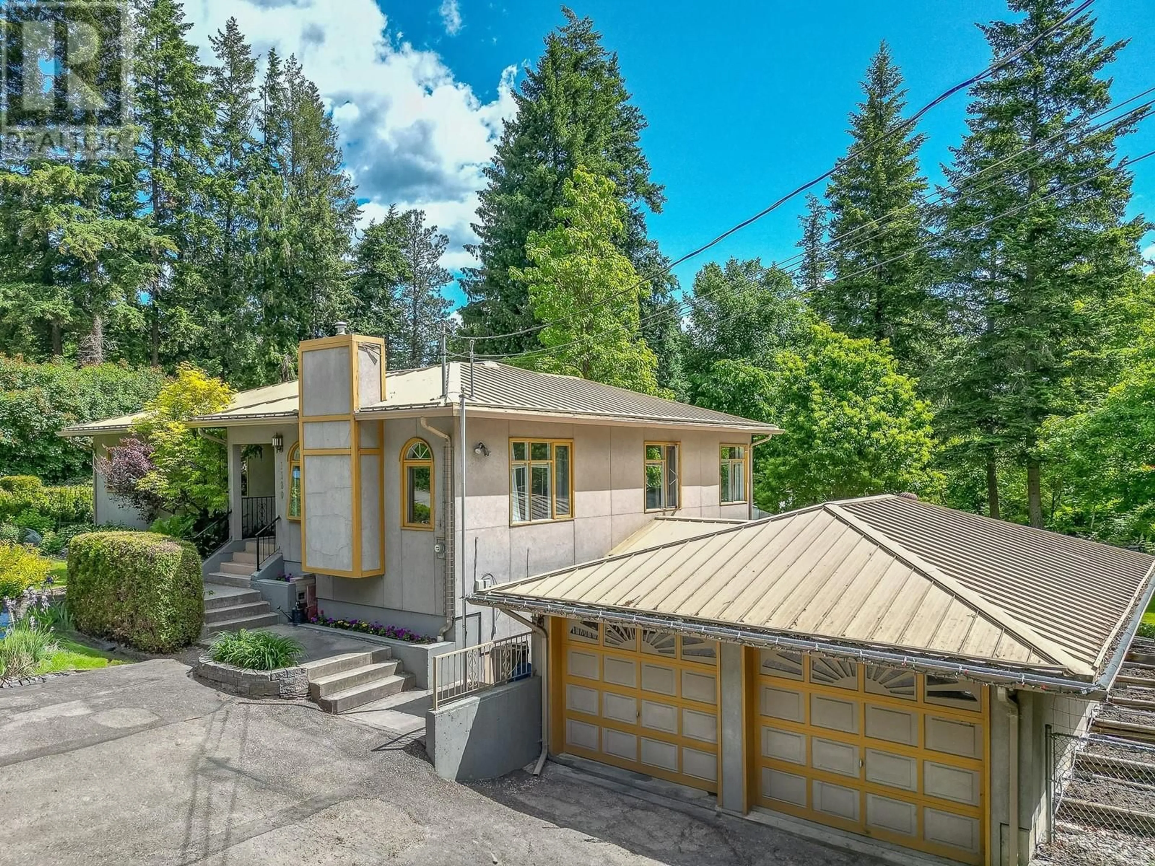 A pic from outside/outdoor area/front of a property/back of a property/a pic from drone, street for 1180 18 STREET NORTHEAST, Salmon Arm British Columbia V1E2T4