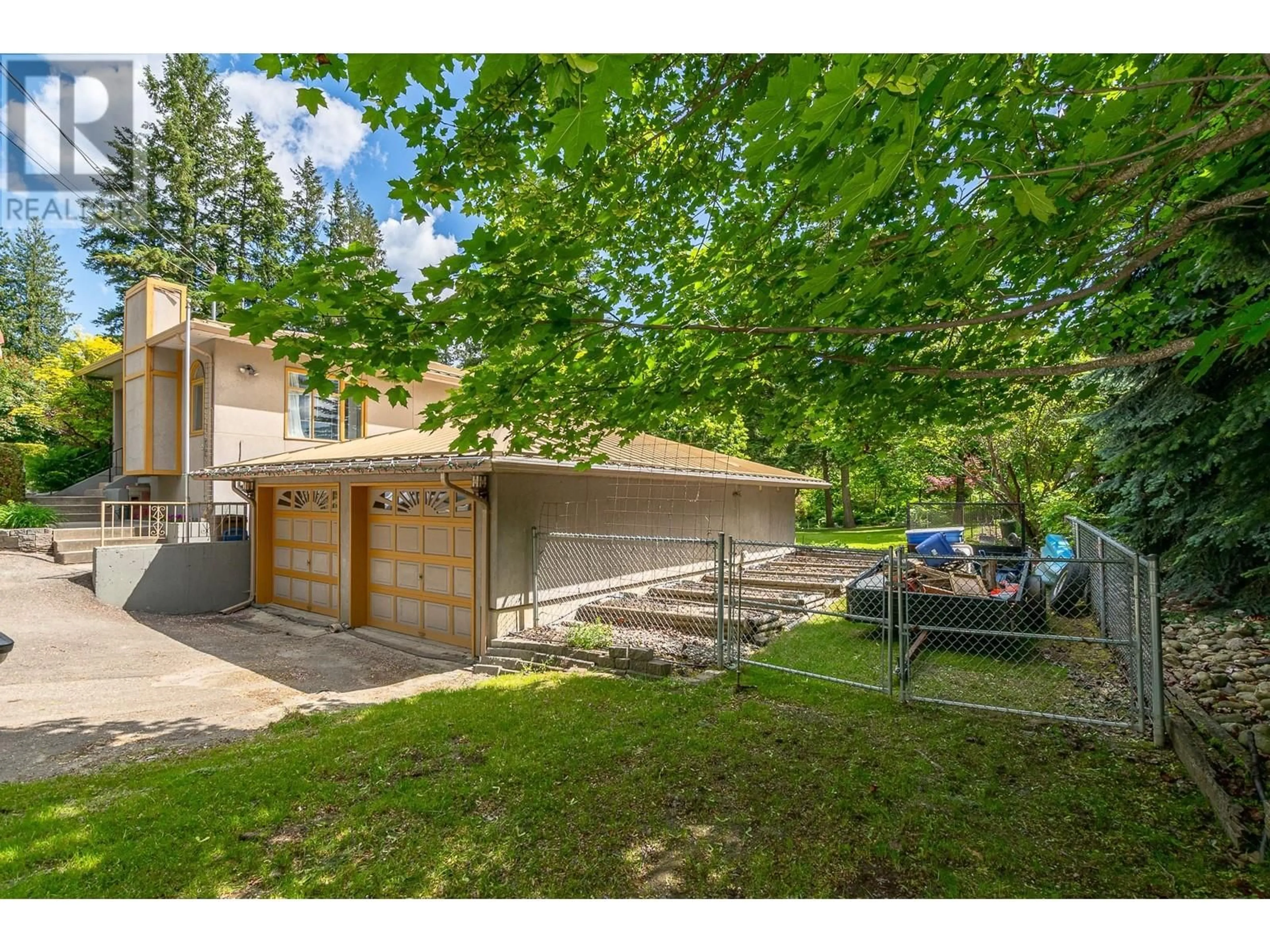 A pic from outside/outdoor area/front of a property/back of a property/a pic from drone, street for 1180 18 STREET NORTHEAST, Salmon Arm British Columbia V1E2T4