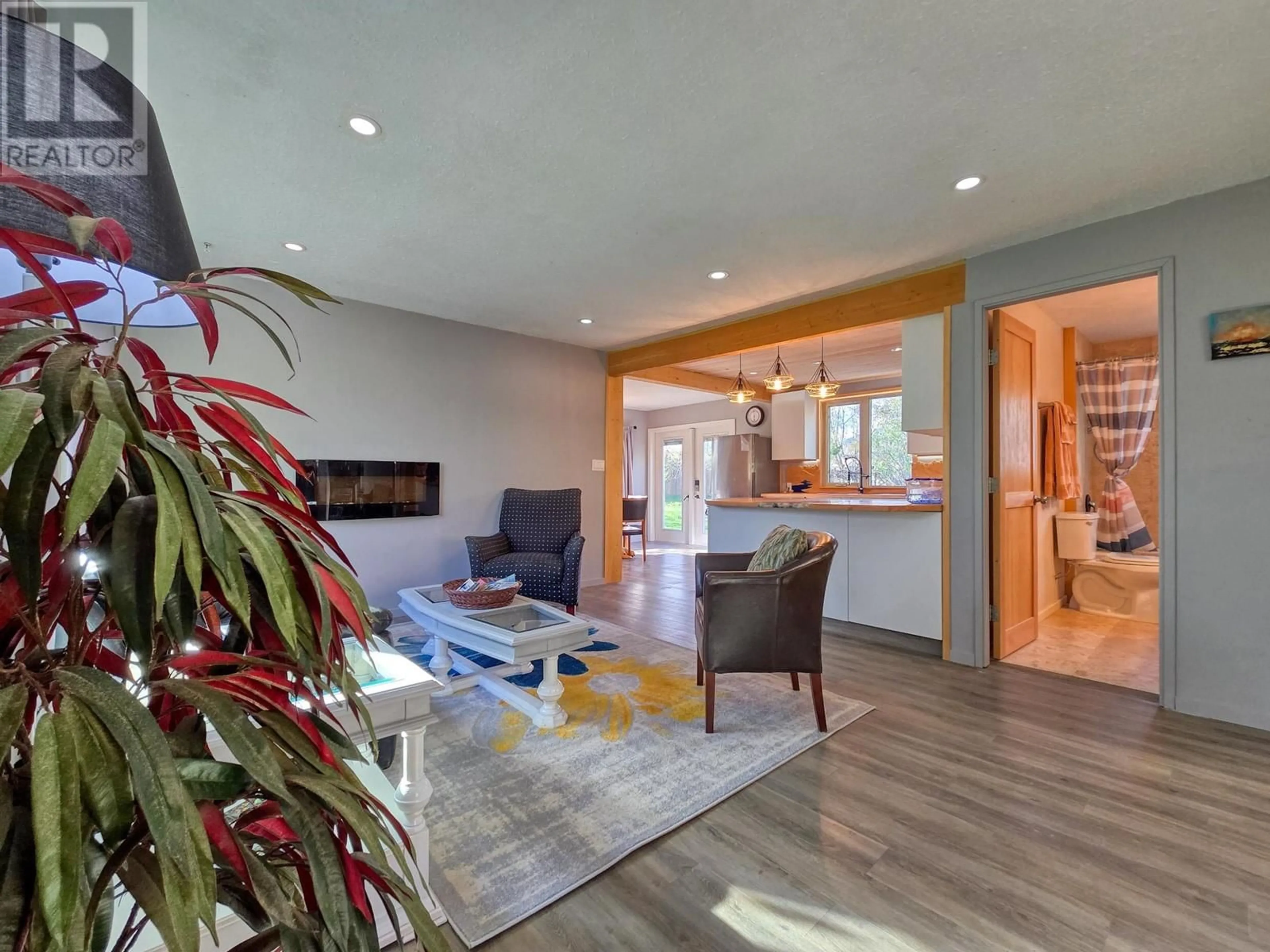 Living room with furniture, wood/laminate floor for 5765 COLUMBIA ROAD, Edgewater British Columbia V0A1E0