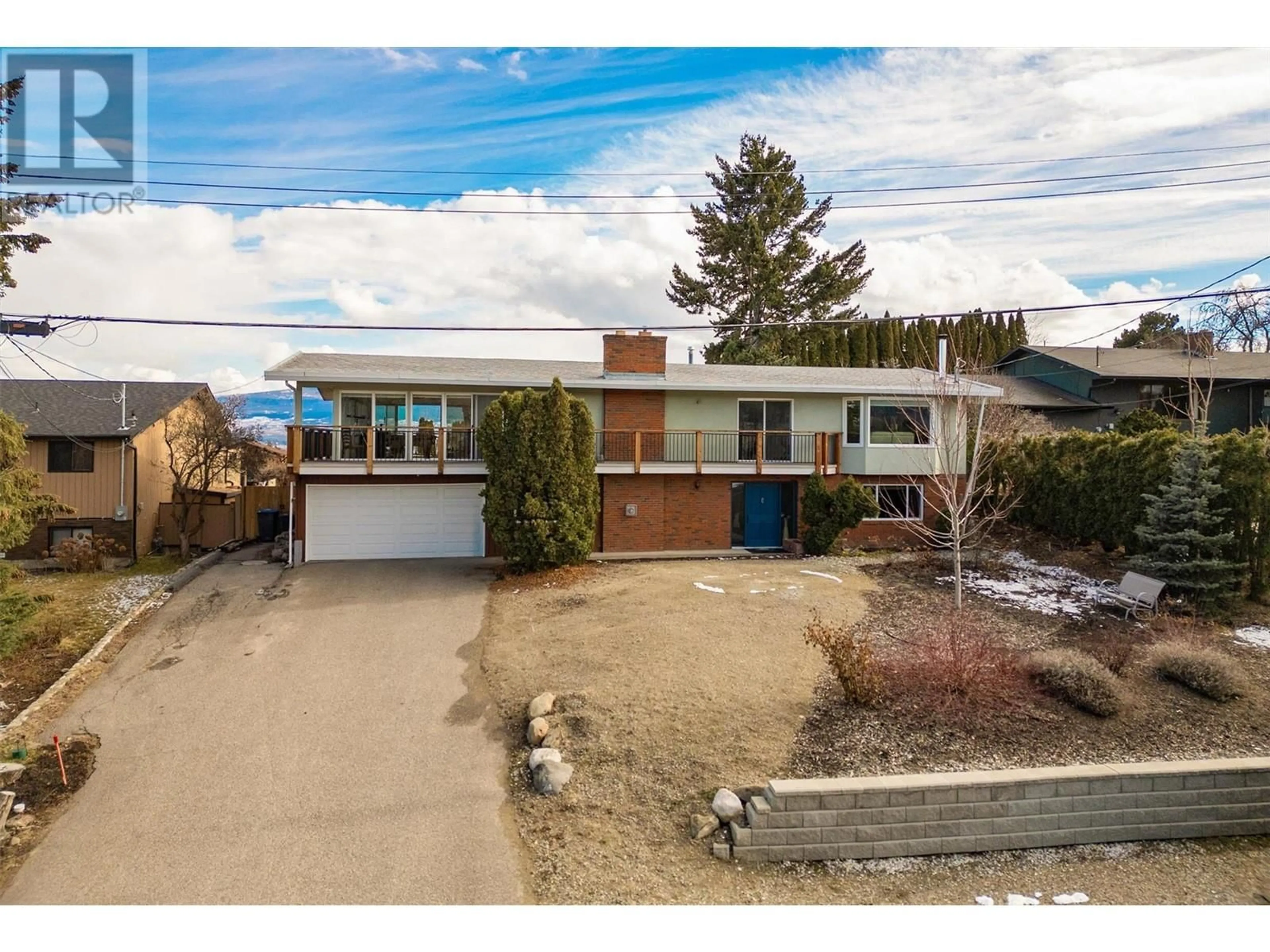 A pic from outside/outdoor area/front of a property/back of a property/a pic from drone, street for 2415 COLLINGWOOD ROAD, West Kelowna British Columbia V1Z2C3