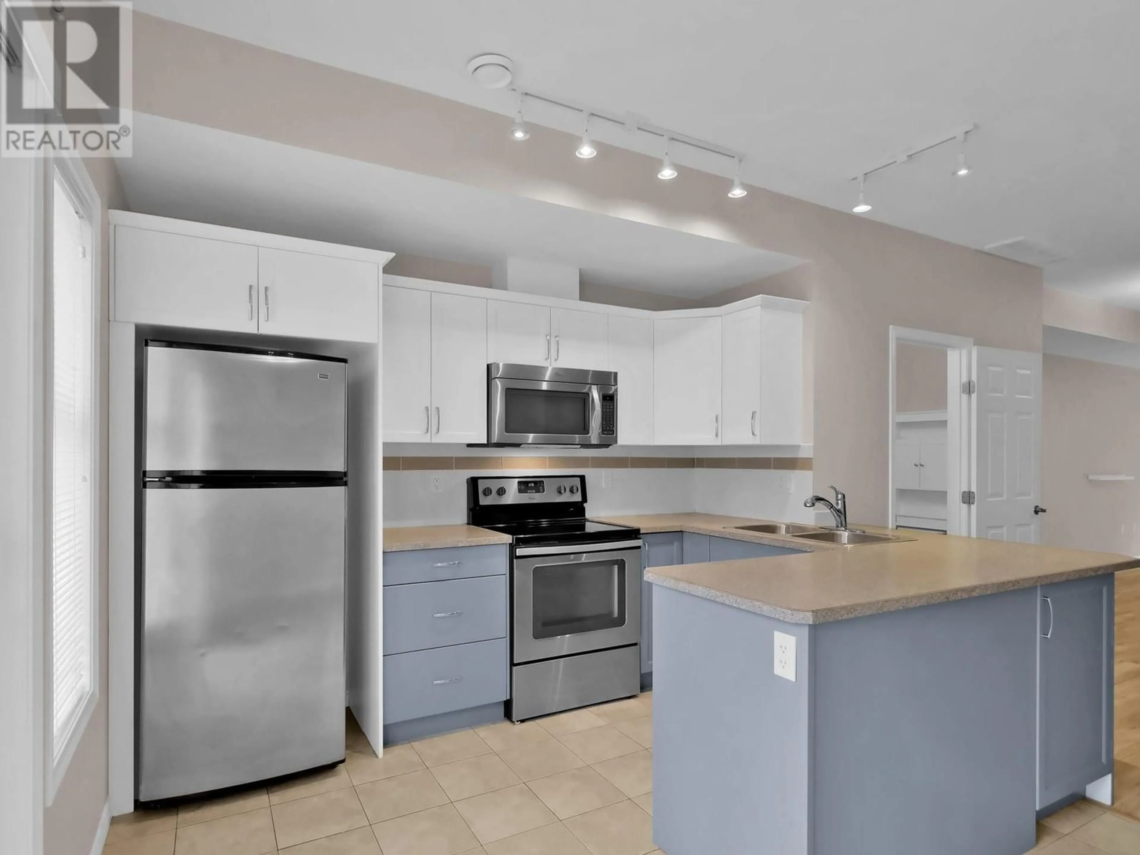 Open concept kitchen, unknown for 140 - 3363 WILSON STREET, Penticton British Columbia V2A9G7