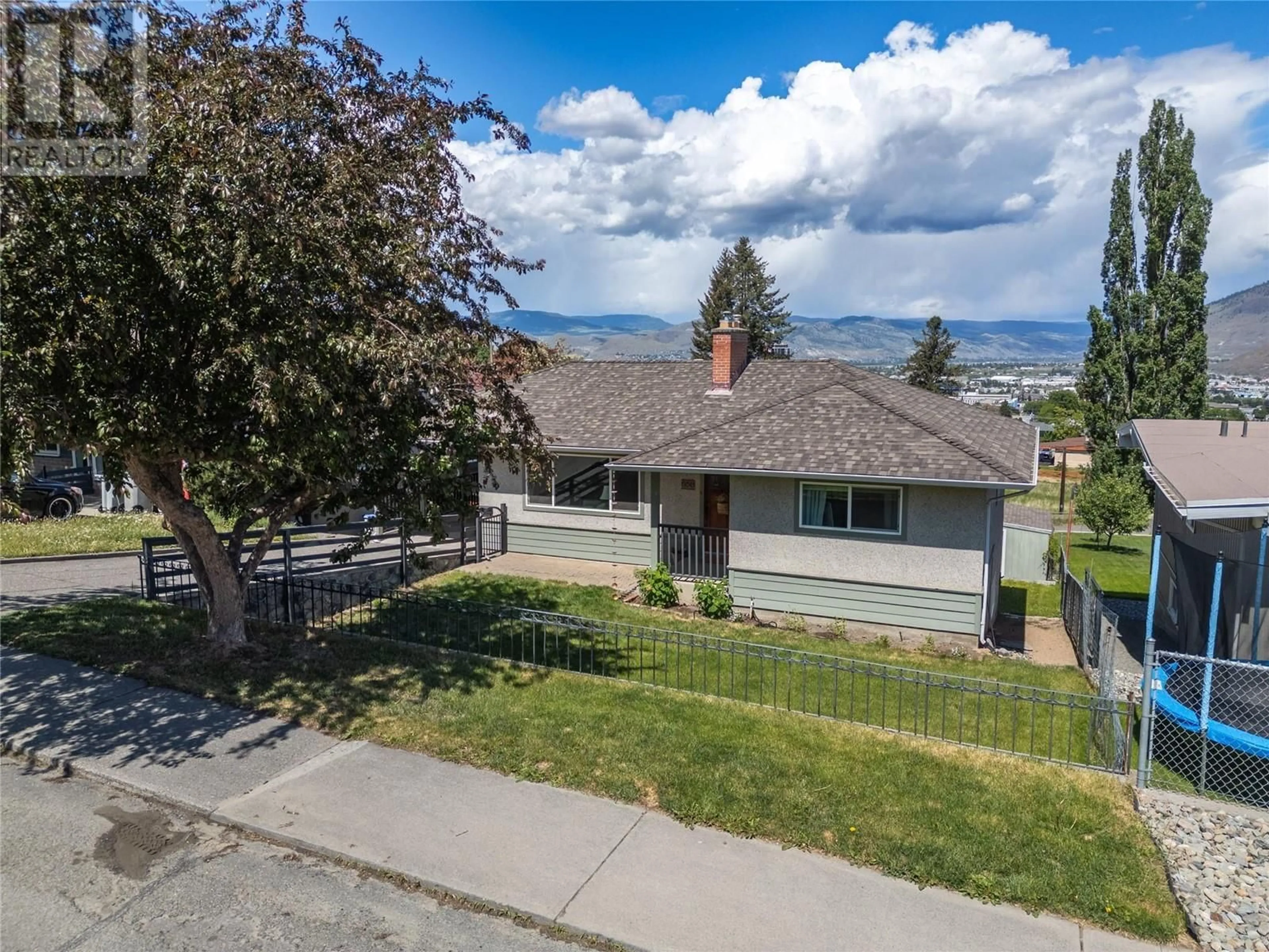 A pic from outside/outdoor area/front of a property/back of a property/a pic from drone, mountain view for 658 FRASER STREET, Kamloops British Columbia V2C3H2