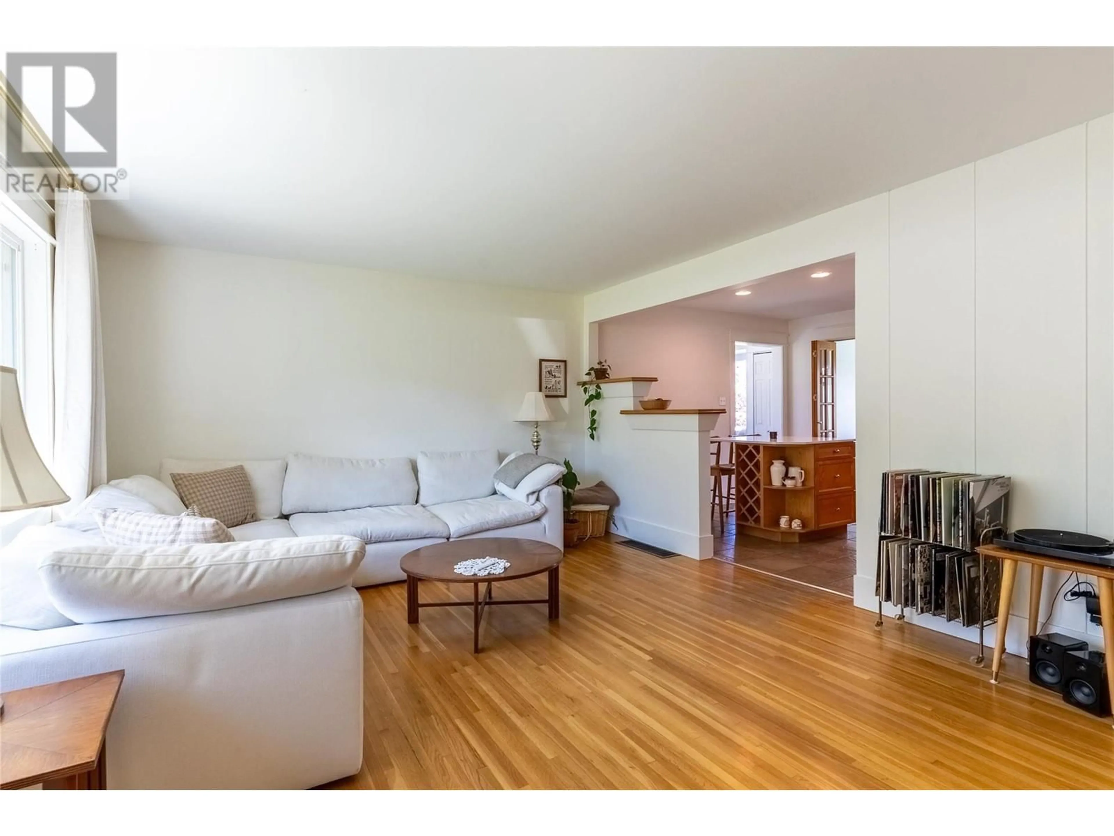Living room with furniture, wood/laminate floor for 658 FRASER STREET, Kamloops British Columbia V2C3H2