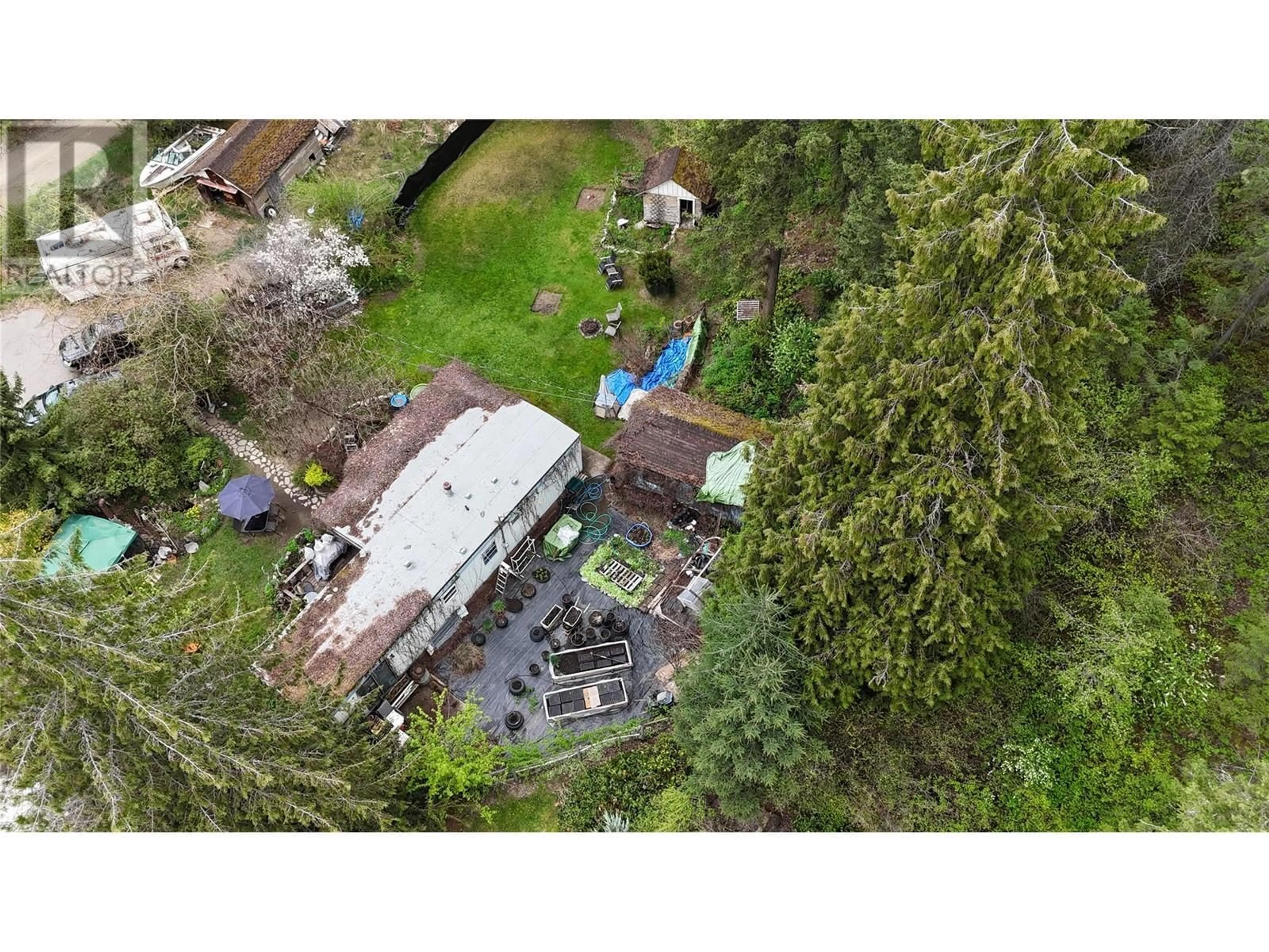 A pic from outside/outdoor area/front of a property/back of a property/a pic from drone, unknown for 1680 CHANDLER ROAD, Christina Lake British Columbia V0H1E0