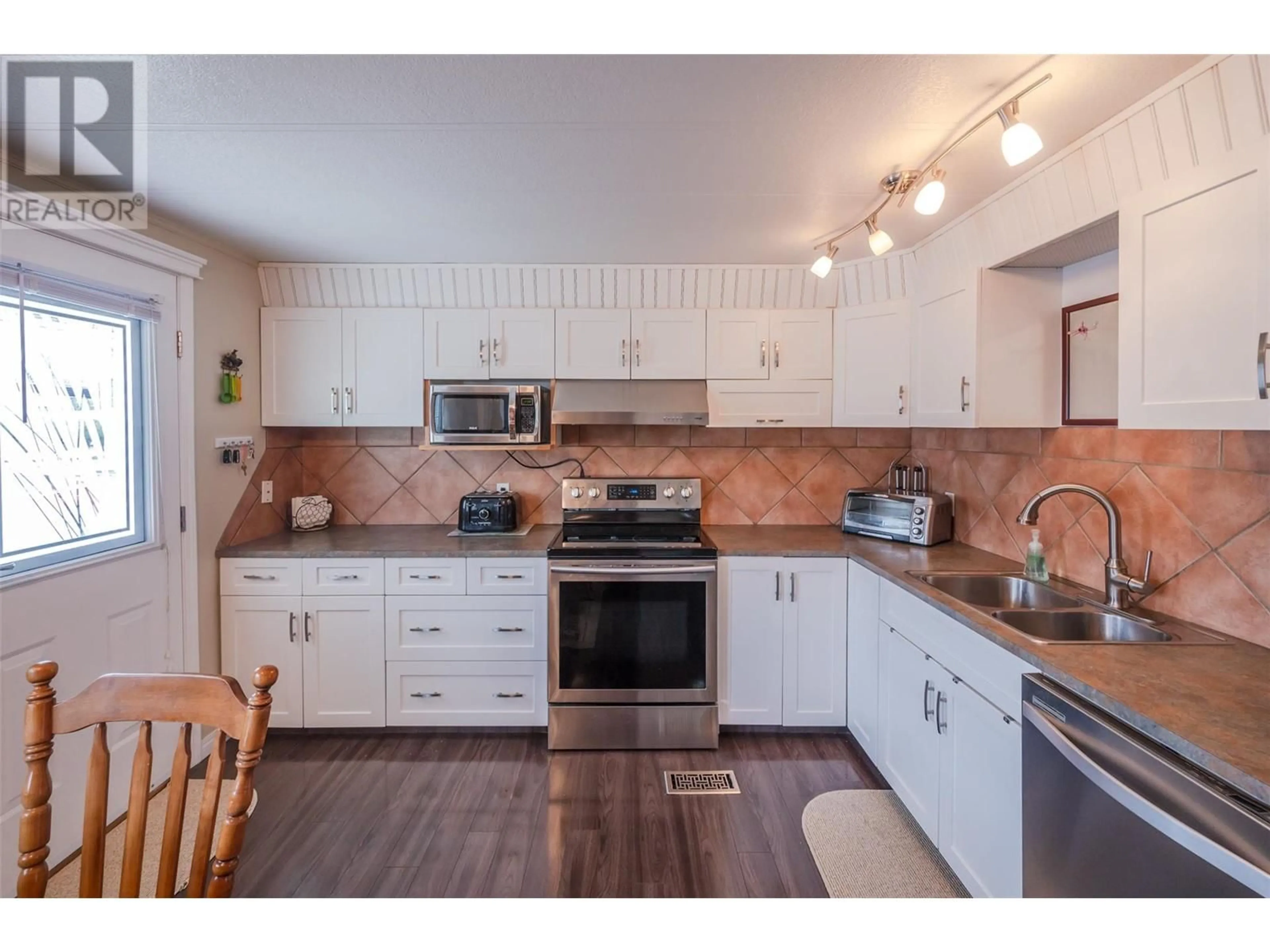 Open concept kitchen, unknown for 308 - 321 YORKTON AVENUE, Penticton British Columbia V2A3V6