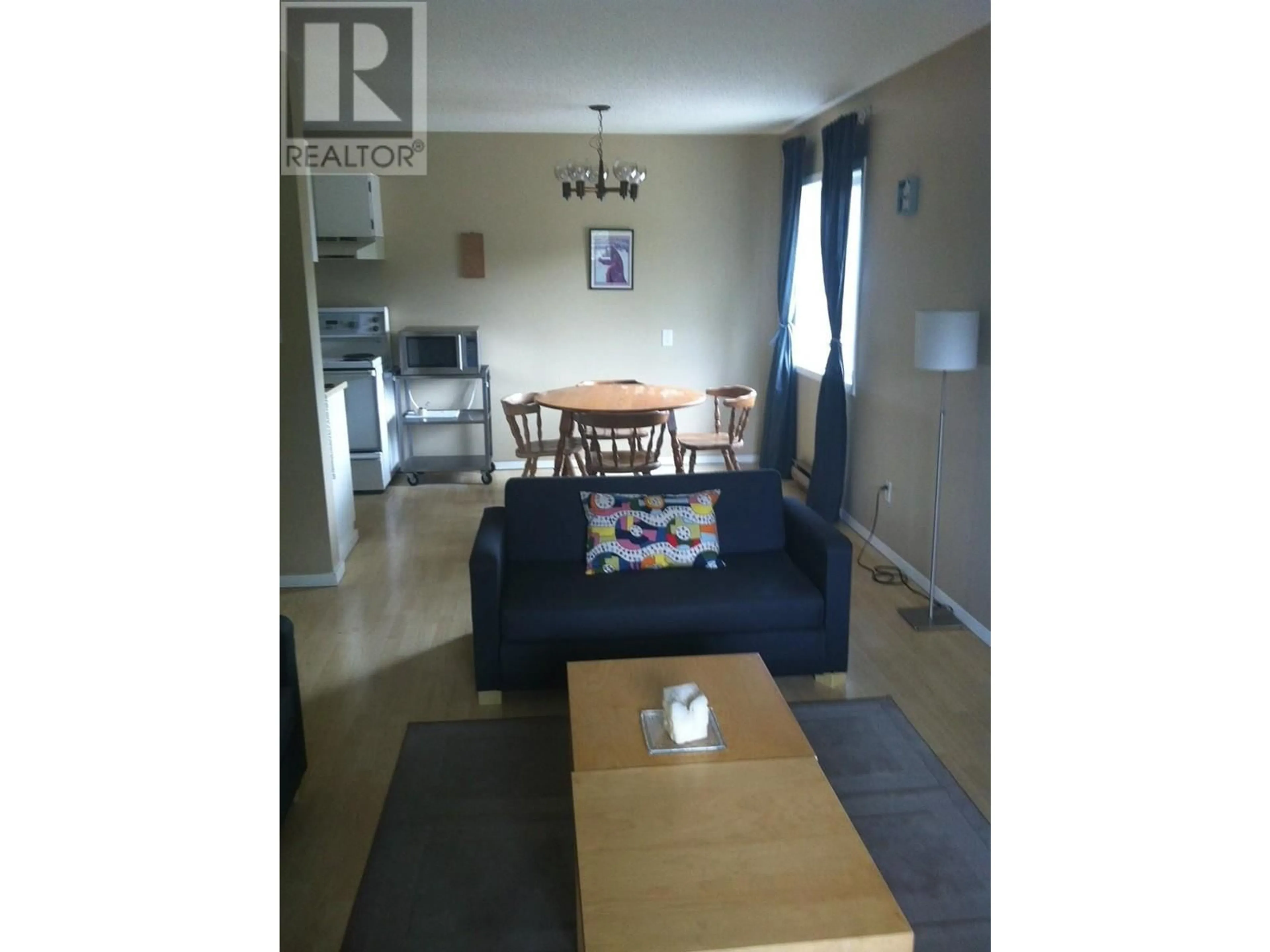 Living room with furniture, wood/laminate floor for 401 - 10 CARIBOO DRIVE, Elkford British Columbia V0B1H0
