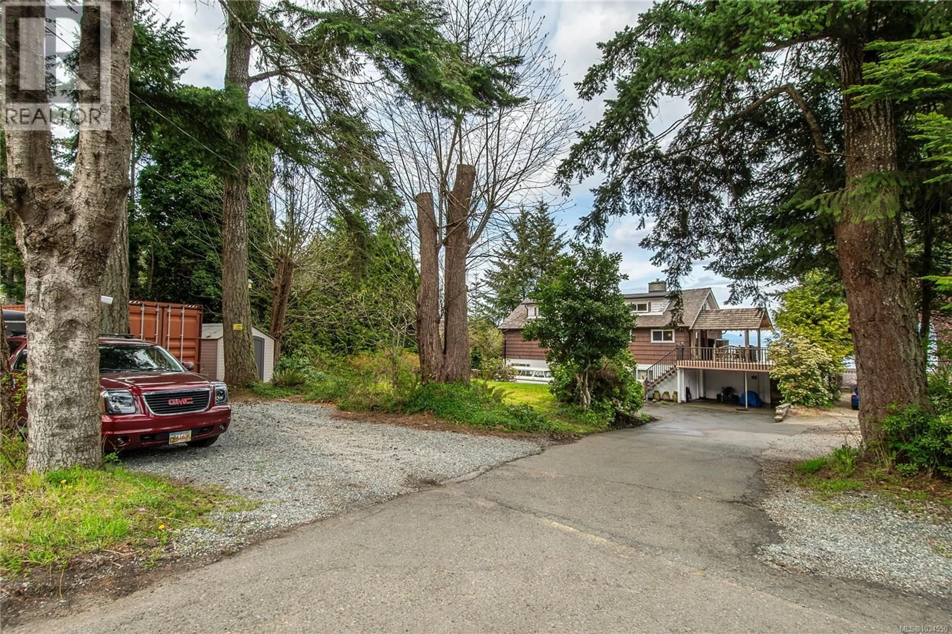 A pic from outside/outdoor area/front of a property/back of a property/a pic from drone, street for 4123 ISLAND HIGHWAY SOUTH, Campbell River British Columbia V9H1E9