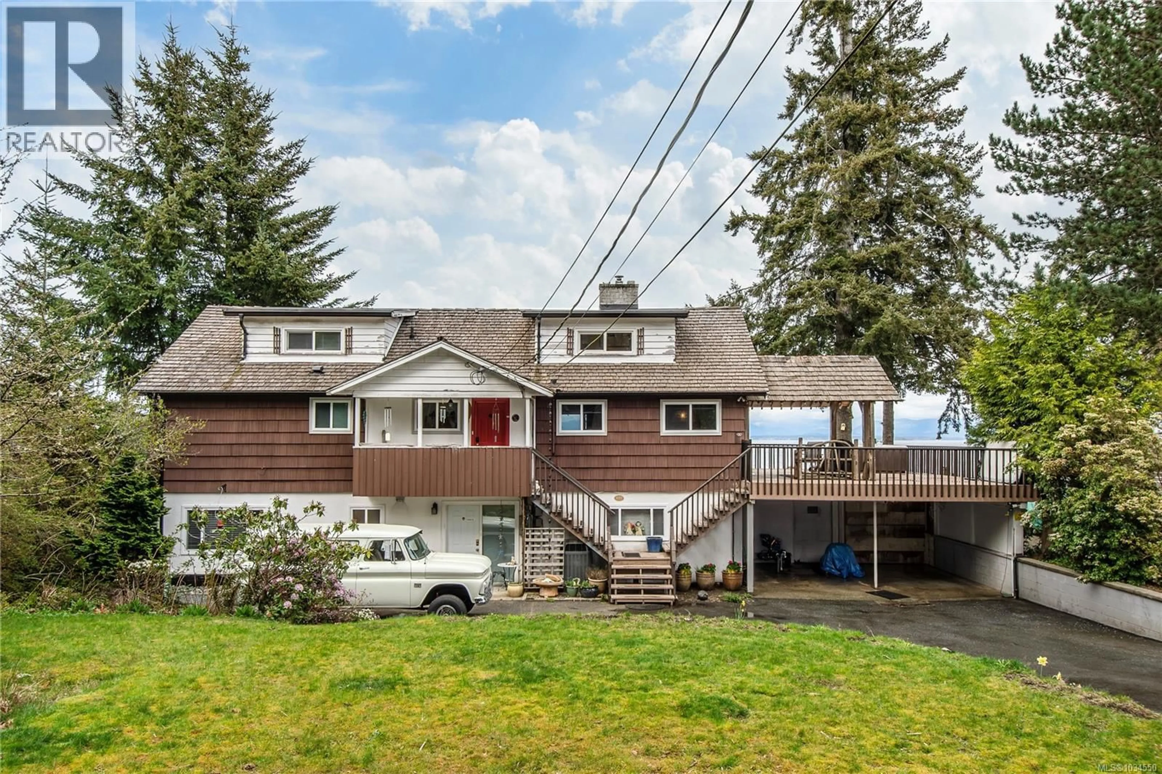 Home with vinyl exterior material, mountain view for 4123 ISLAND HIGHWAY SOUTH, Campbell River British Columbia V9H1E9