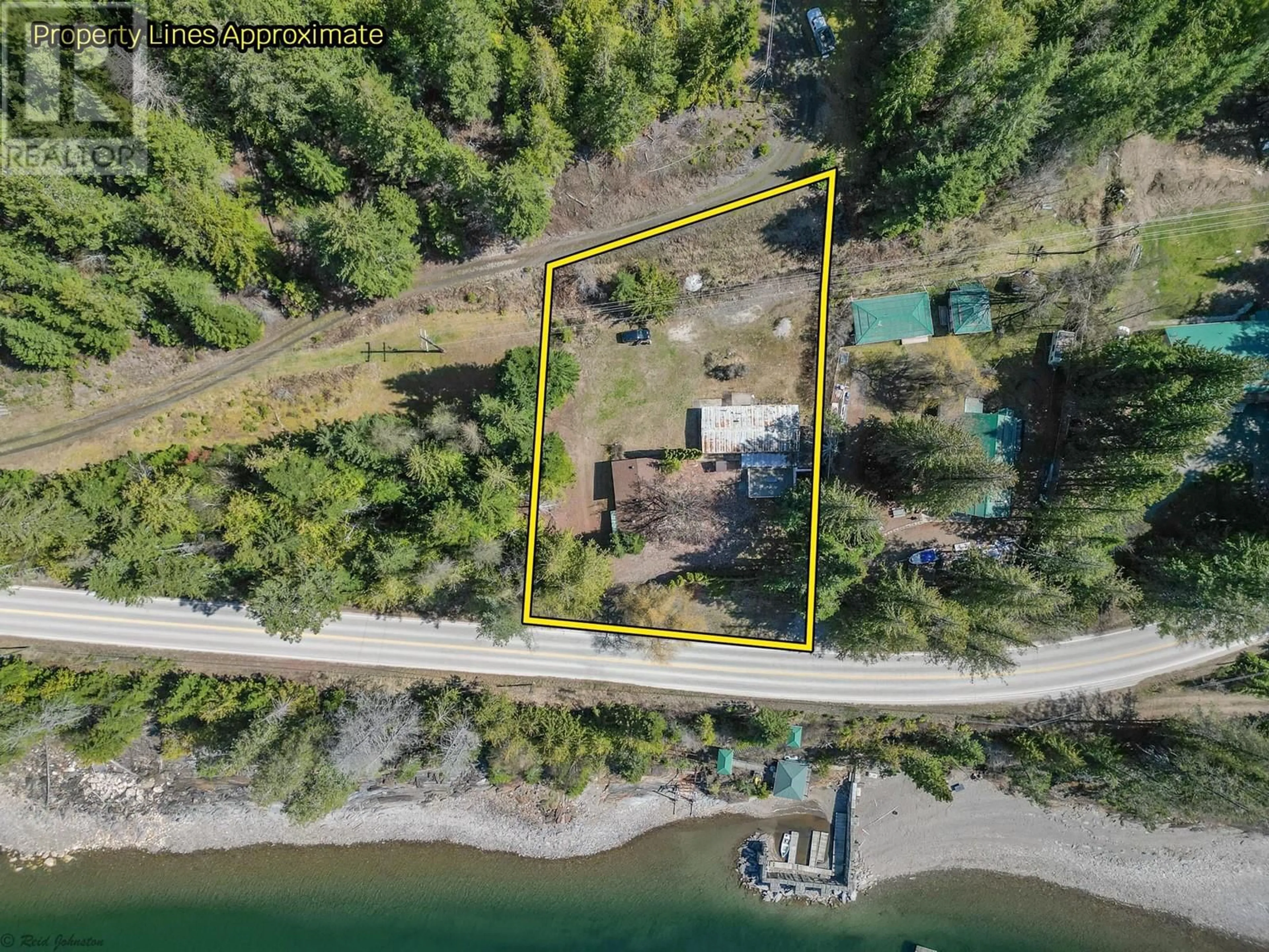 A pic from outside/outdoor area/front of a property/back of a property/a pic from drone, water/lake/river/ocean view for 12830 3A HIGHWAY, Boswell British Columbia V0B1A4
