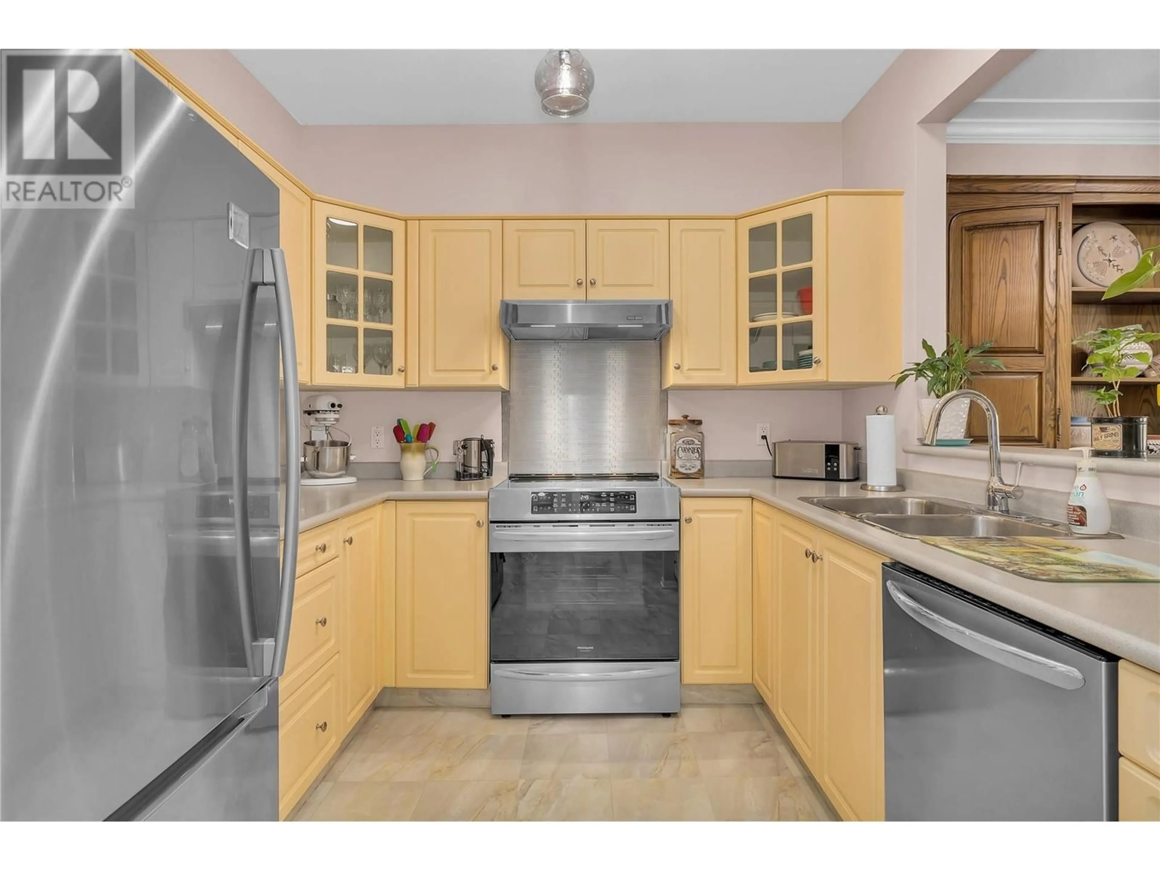 Standard kitchen, ceramic/tile floor for 217 - 877 KLO ROAD, Kelowna British Columbia V1Y9R1