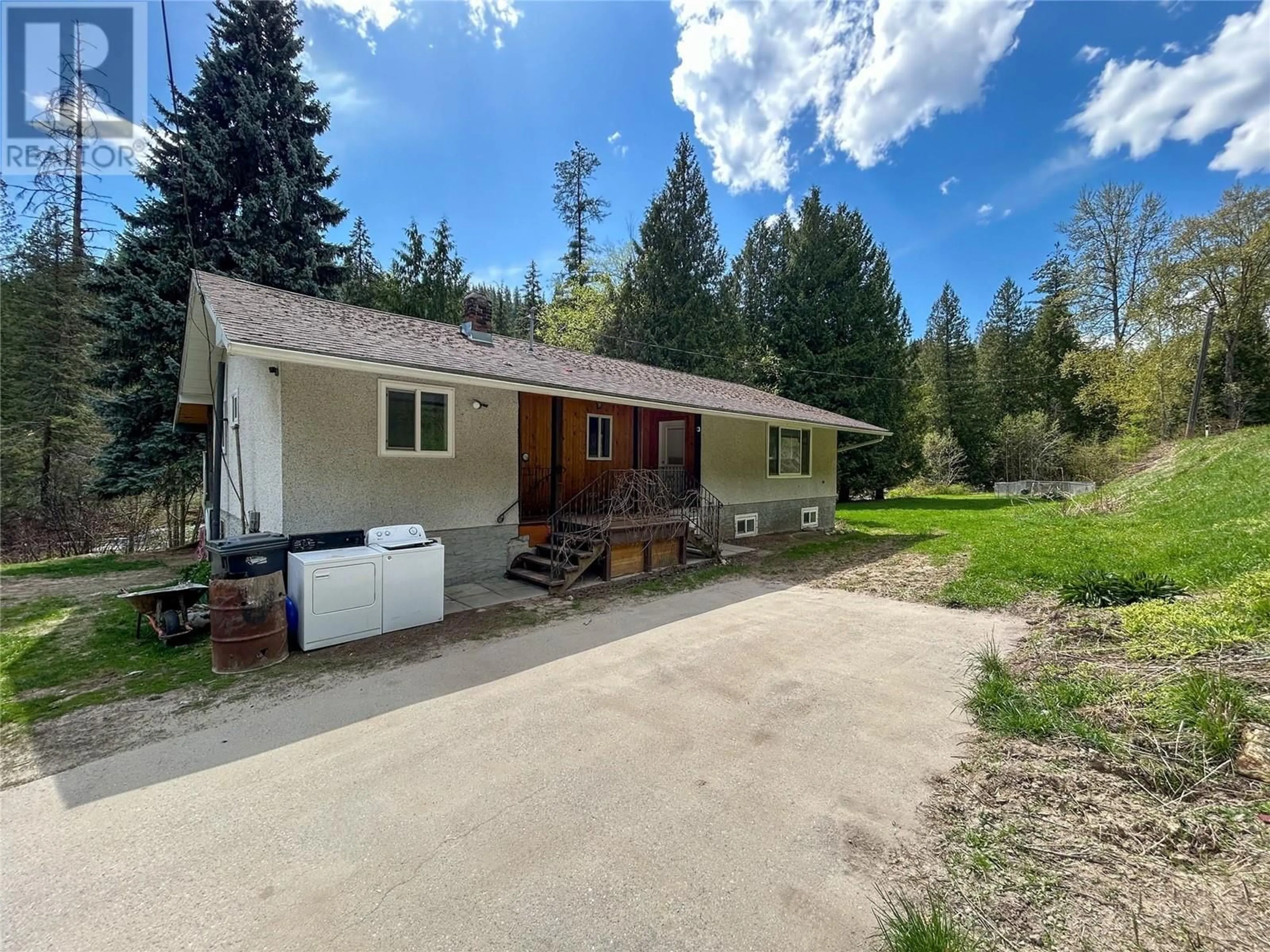 A pic from outside/outdoor area/front of a property/back of a property/a pic from drone, unknown for 1486 PASS CREEK ROAD, Castlegar British Columbia V1N4S2