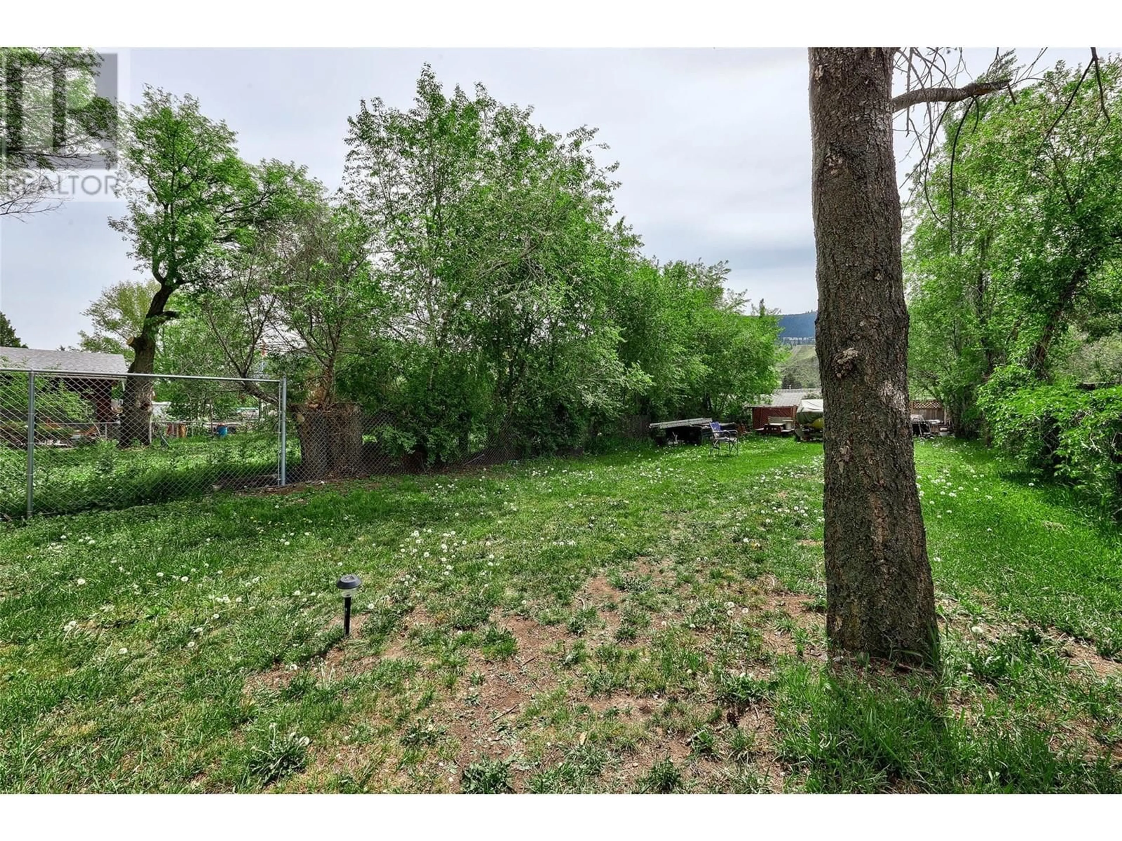A pic from outside/outdoor area/front of a property/back of a property/a pic from drone, forest/trees view for 2615 THOMPSON DRIVE, Kamloops British Columbia V2C4L5
