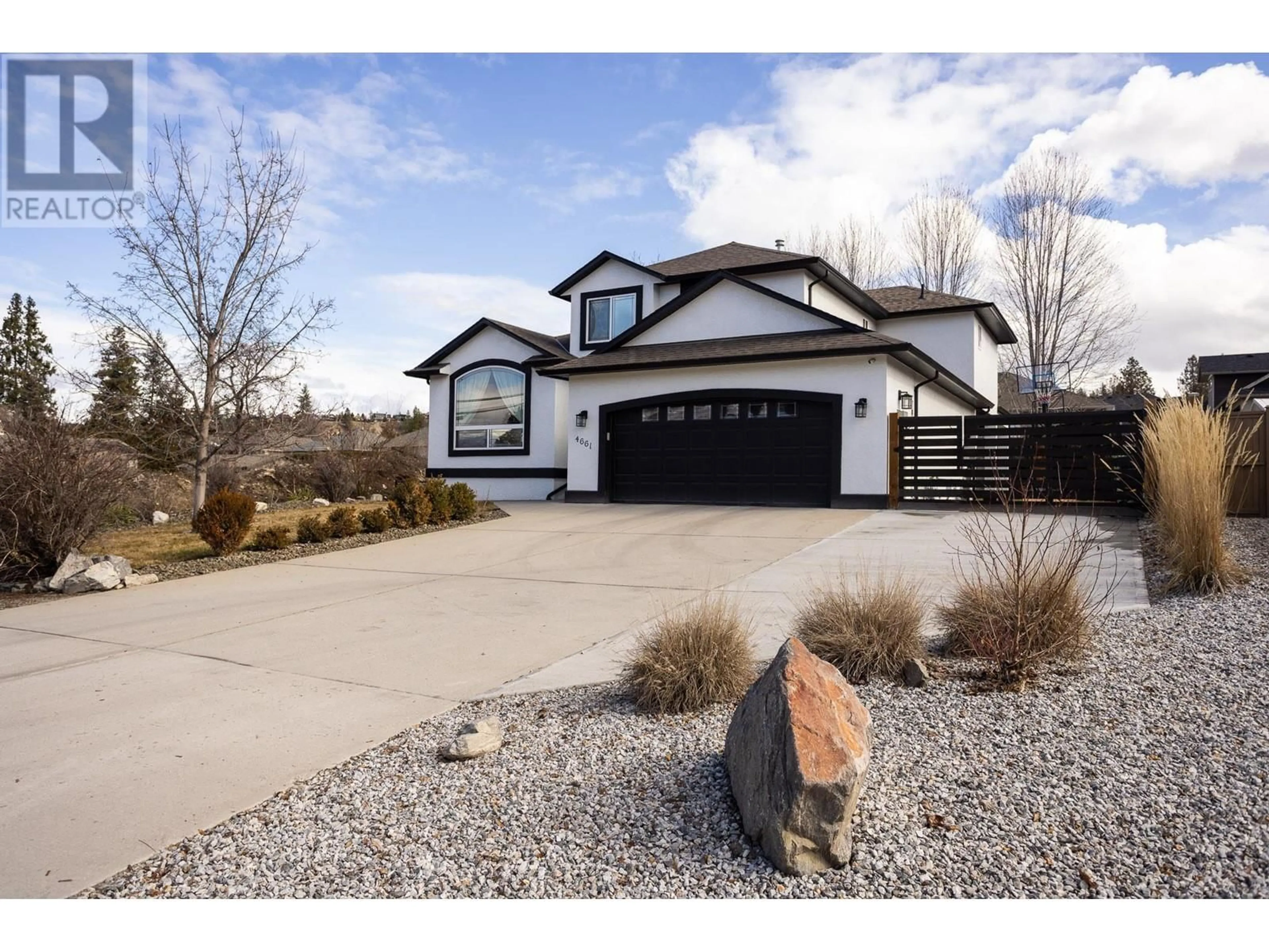 Home with vinyl exterior material, street for 4661 GORDON DRIVE, Kelowna British Columbia V1W1T5