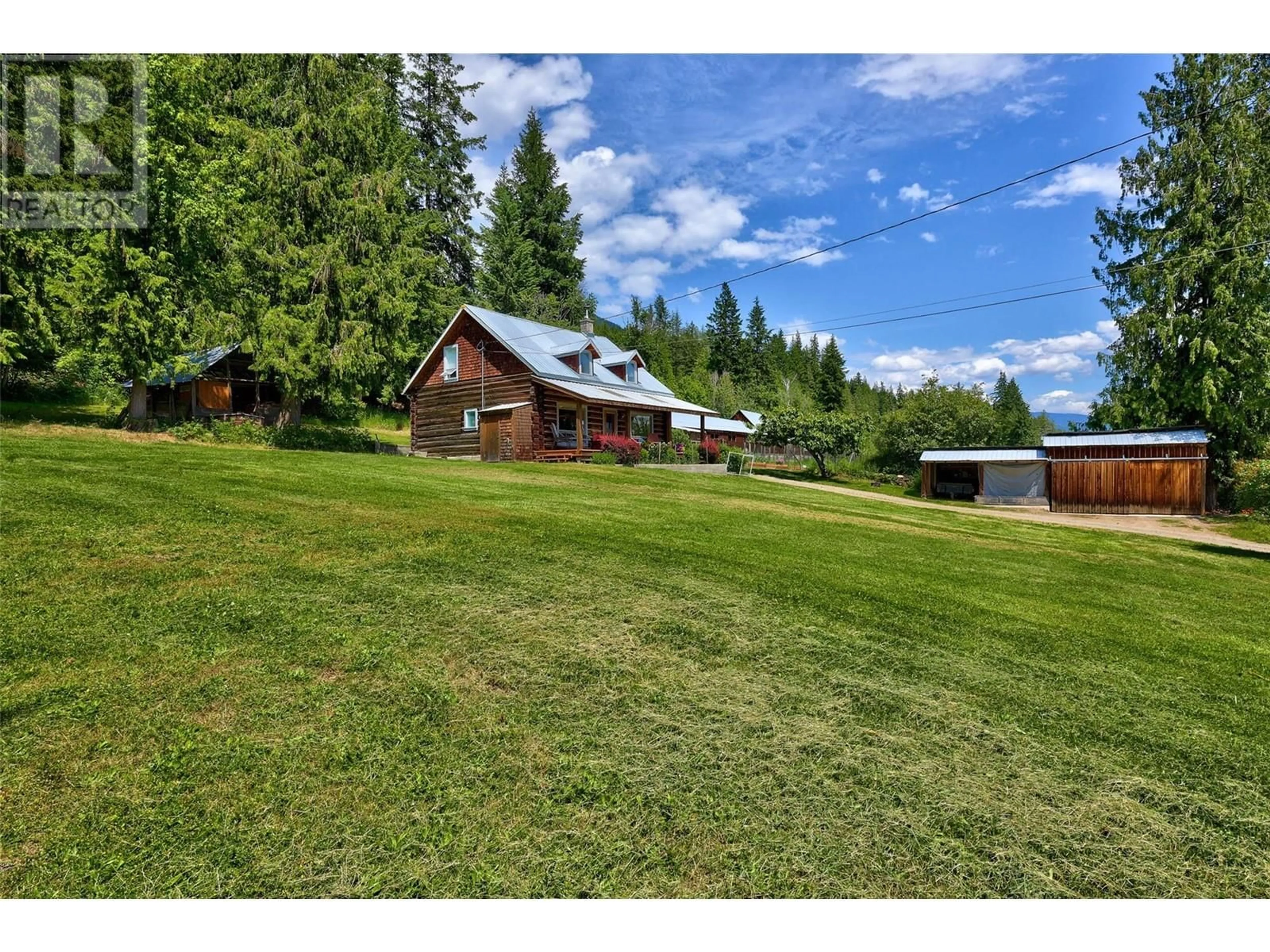 A pic from outside/outdoor area/front of a property/back of a property/a pic from drone, mountain view for 7483 SQUILAX-ANGLEMONT ROAD, Anglemont British Columbia V0E1M8
