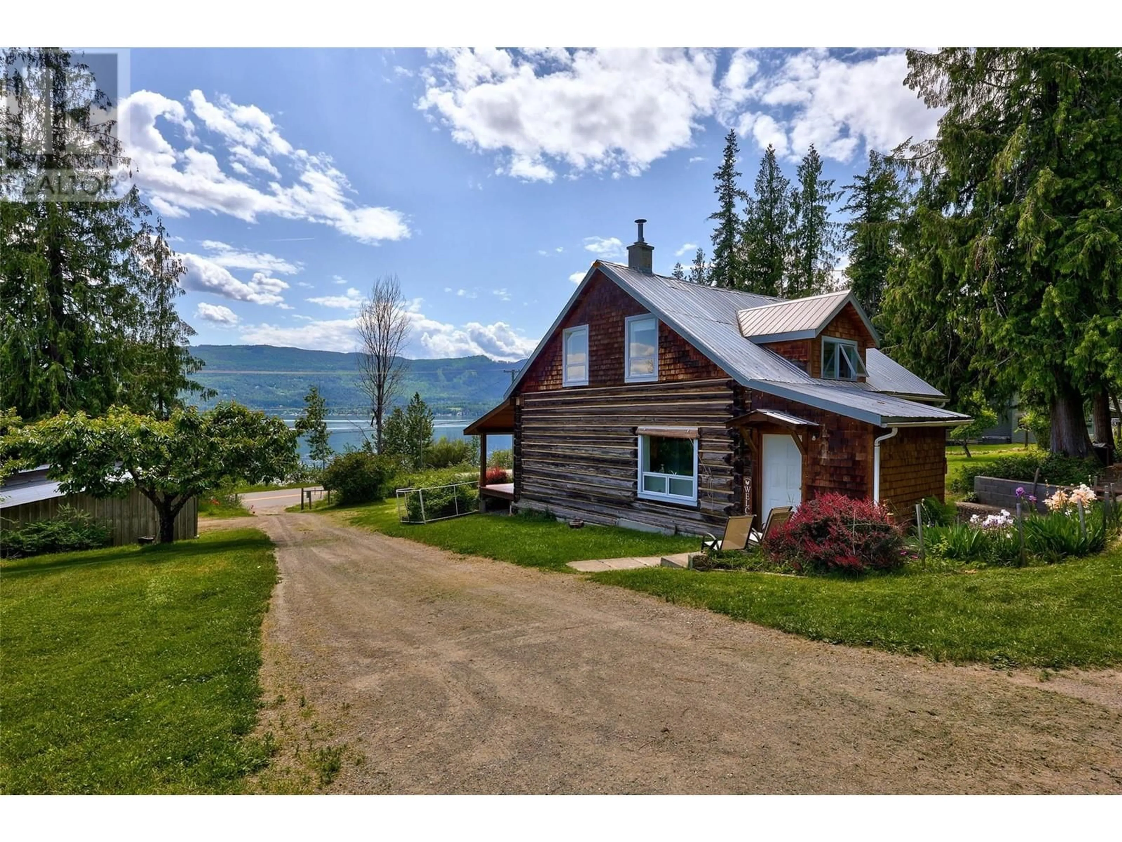 A pic from outside/outdoor area/front of a property/back of a property/a pic from drone, water/lake/river/ocean view for 7483 SQUILAX-ANGLEMONT ROAD, Anglemont British Columbia V0E1M8