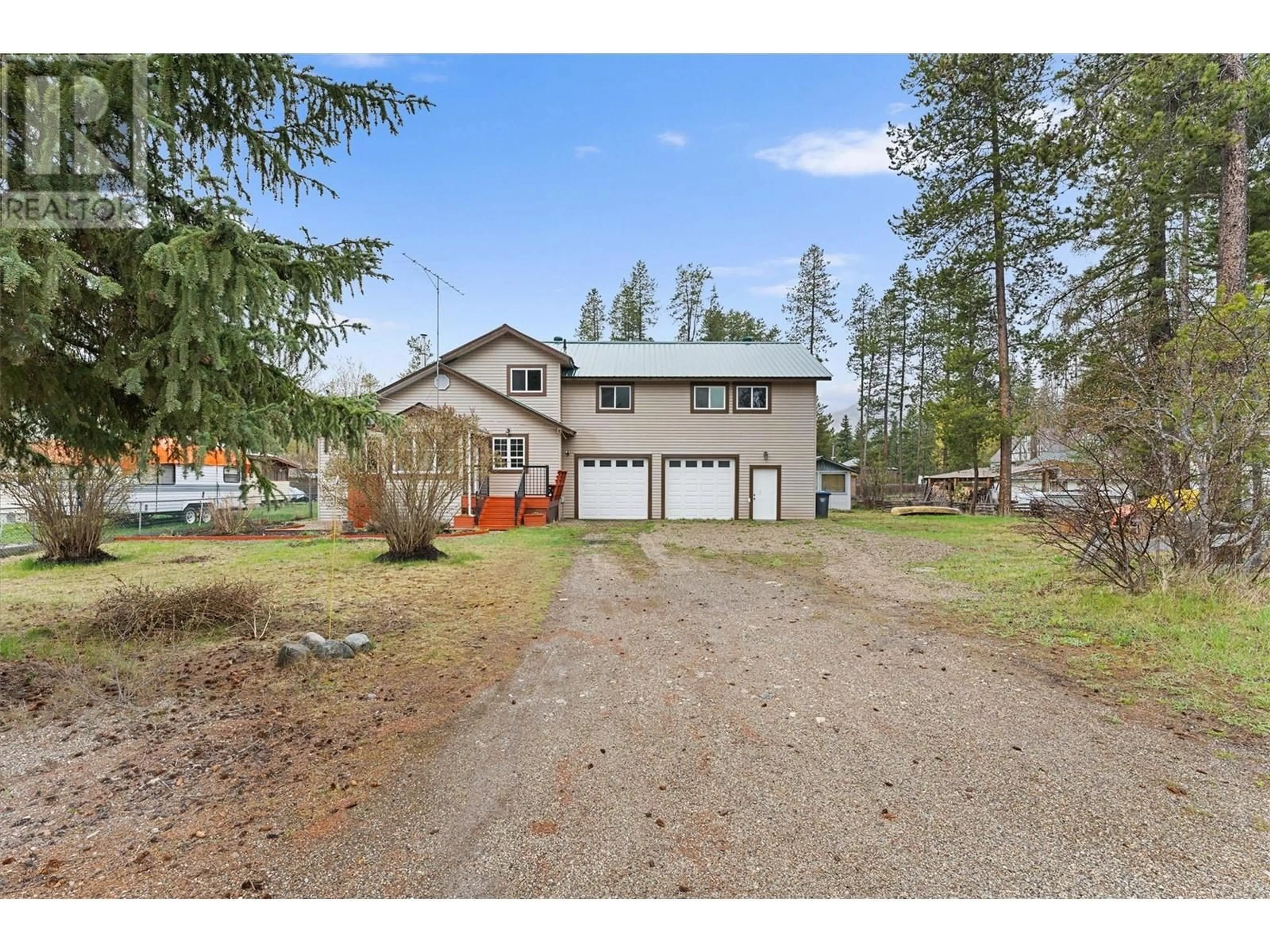 A pic from outside/outdoor area/front of a property/back of a property/a pic from drone, street for 2190 DION ROAD, Kelowna British Columbia V1X1K2