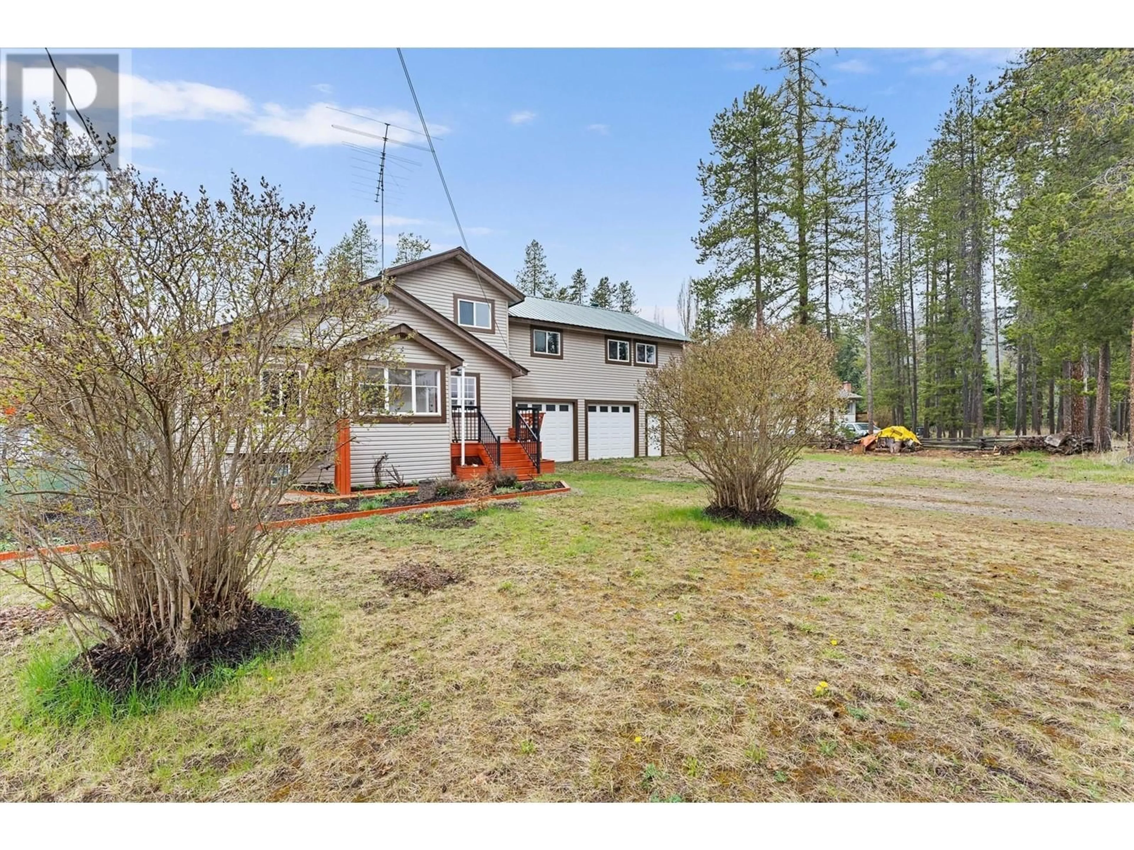 A pic from outside/outdoor area/front of a property/back of a property/a pic from drone, street for 2190 DION ROAD, Kelowna British Columbia V1X1K2