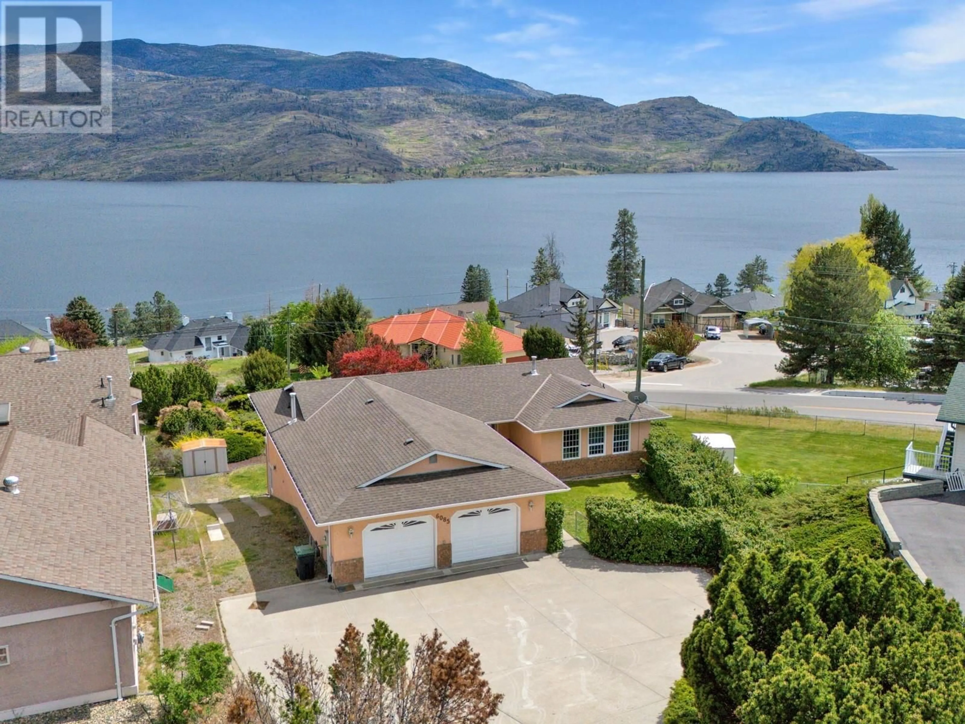 A pic from outside/outdoor area/front of a property/back of a property/a pic from drone, water/lake/river/ocean view for 6085 BEATRICE ROAD, Peachland British Columbia V0H1X4