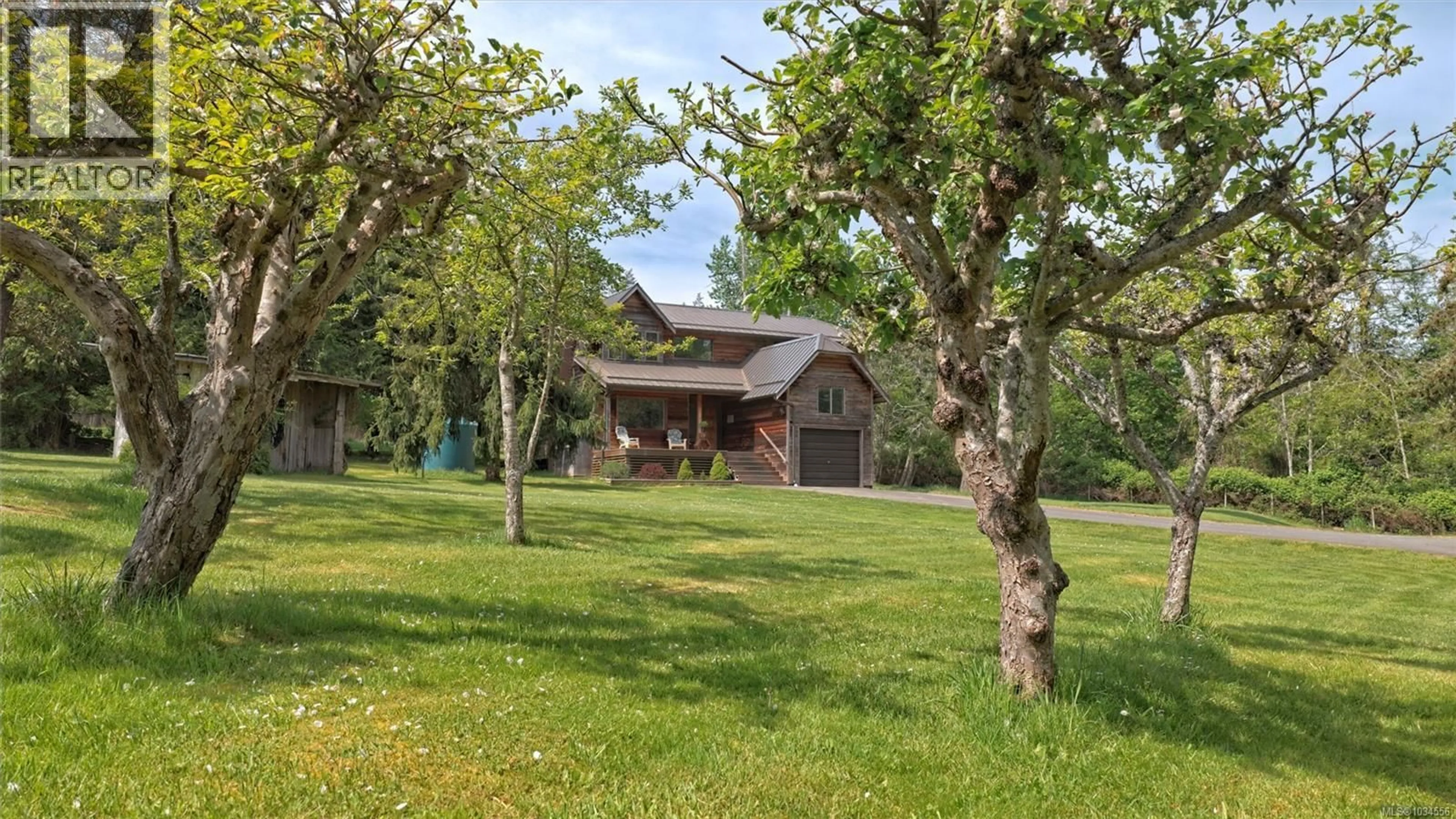A pic from outside/outdoor area/front of a property/back of a property/a pic from drone, street for 144 HEDGER ROAD, Salt Spring British Columbia V8K1B6
