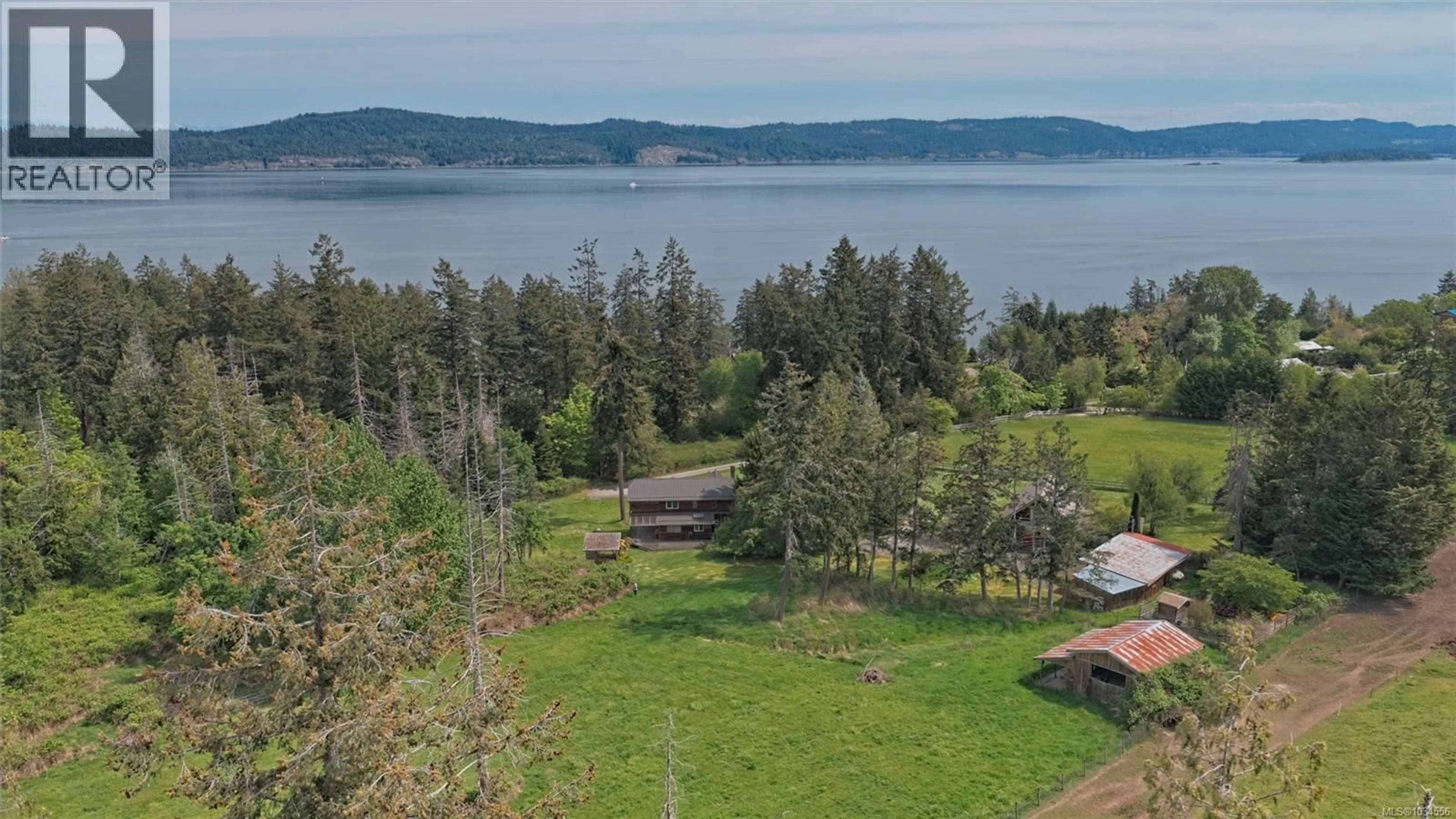 A pic from outside/outdoor area/front of a property/back of a property/a pic from drone, water/lake/river/ocean view for 144 HEDGER ROAD, Salt Spring British Columbia V8K1B6