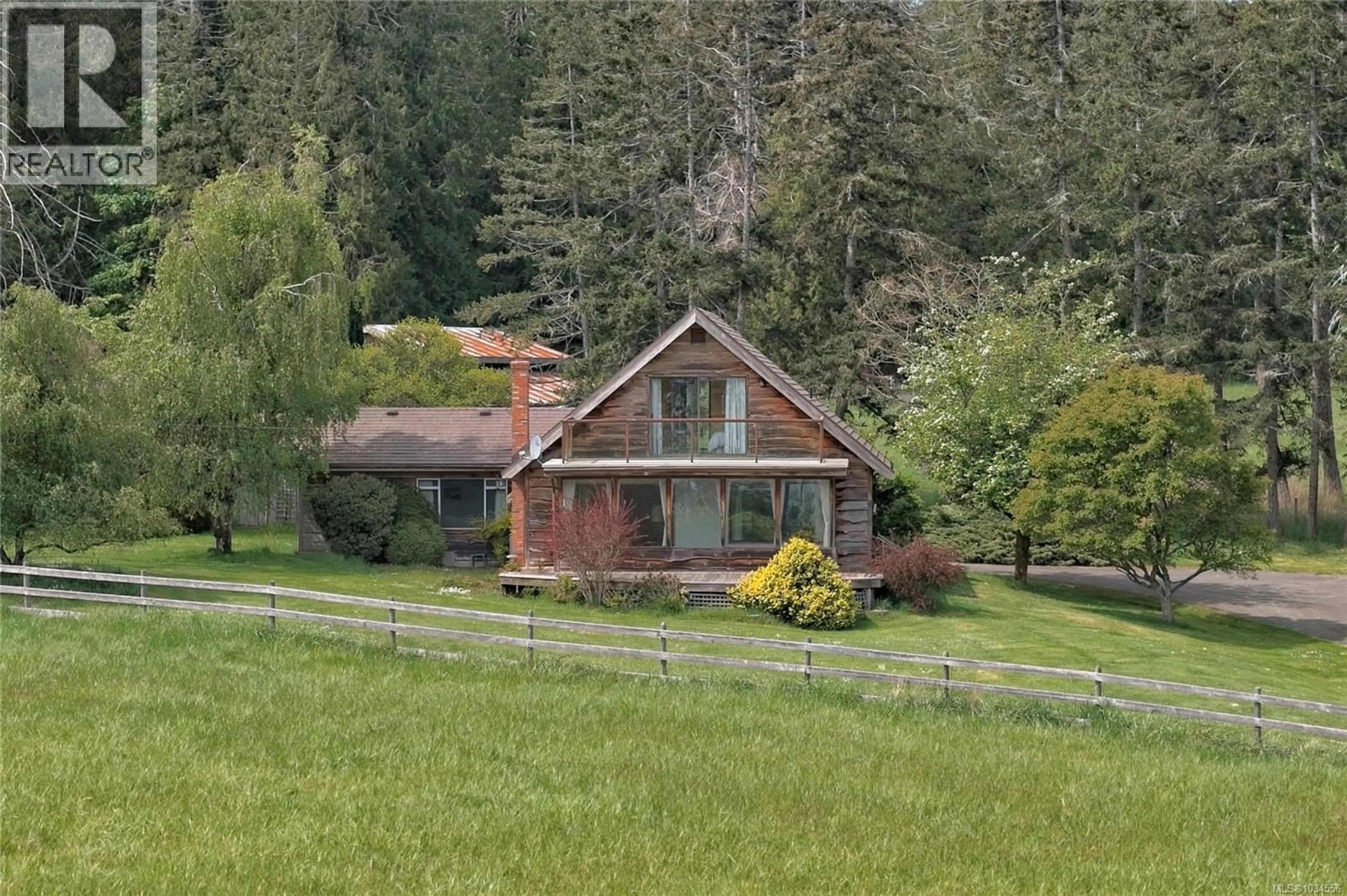 A pic from outside/outdoor area/front of a property/back of a property/a pic from drone, mountain view for 144 HEDGER ROAD, Salt Spring British Columbia V8K1B6