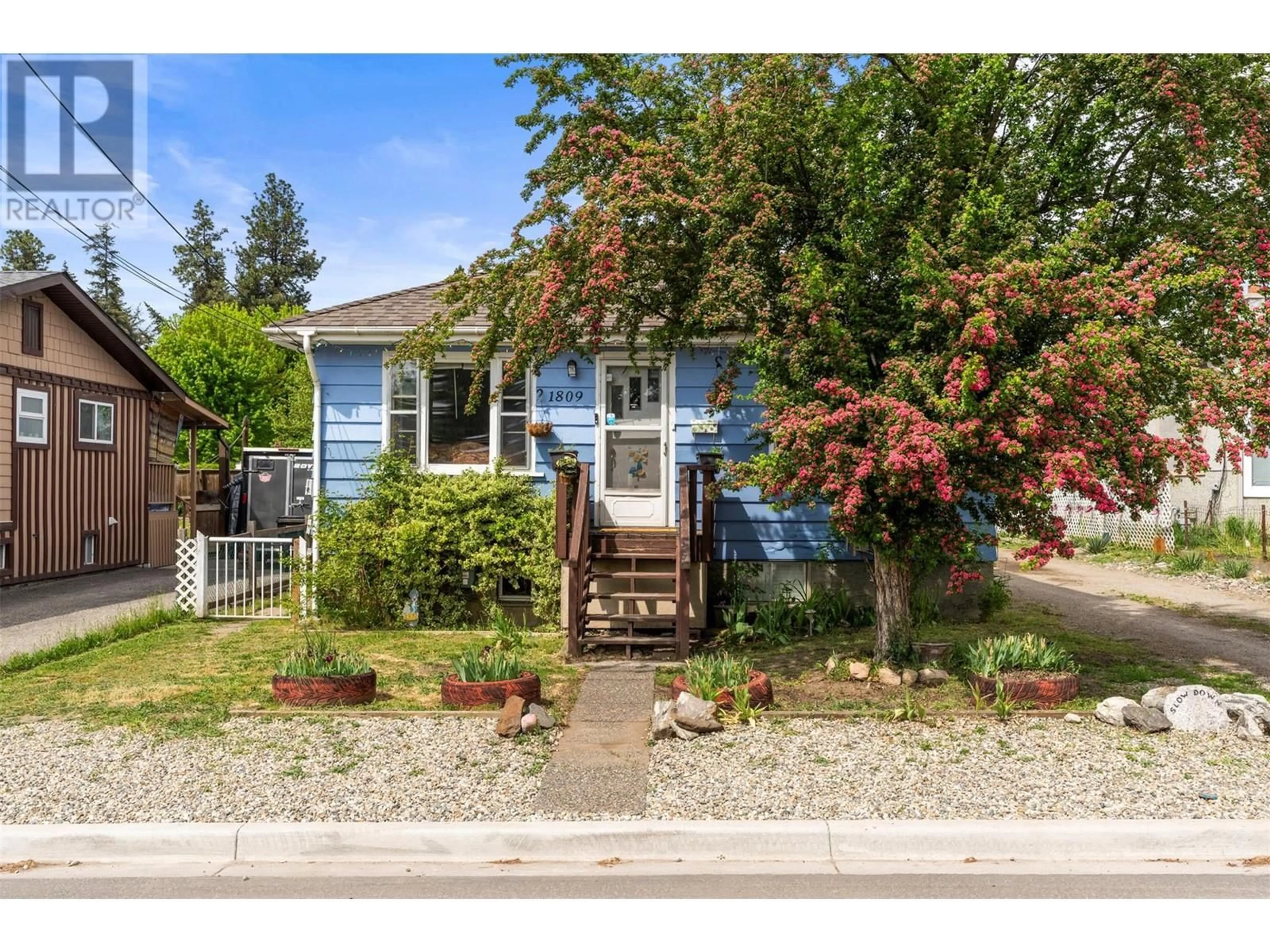 Home with vinyl exterior material, street for 1809 46 AVENUE, Vernon British Columbia V1T3P4