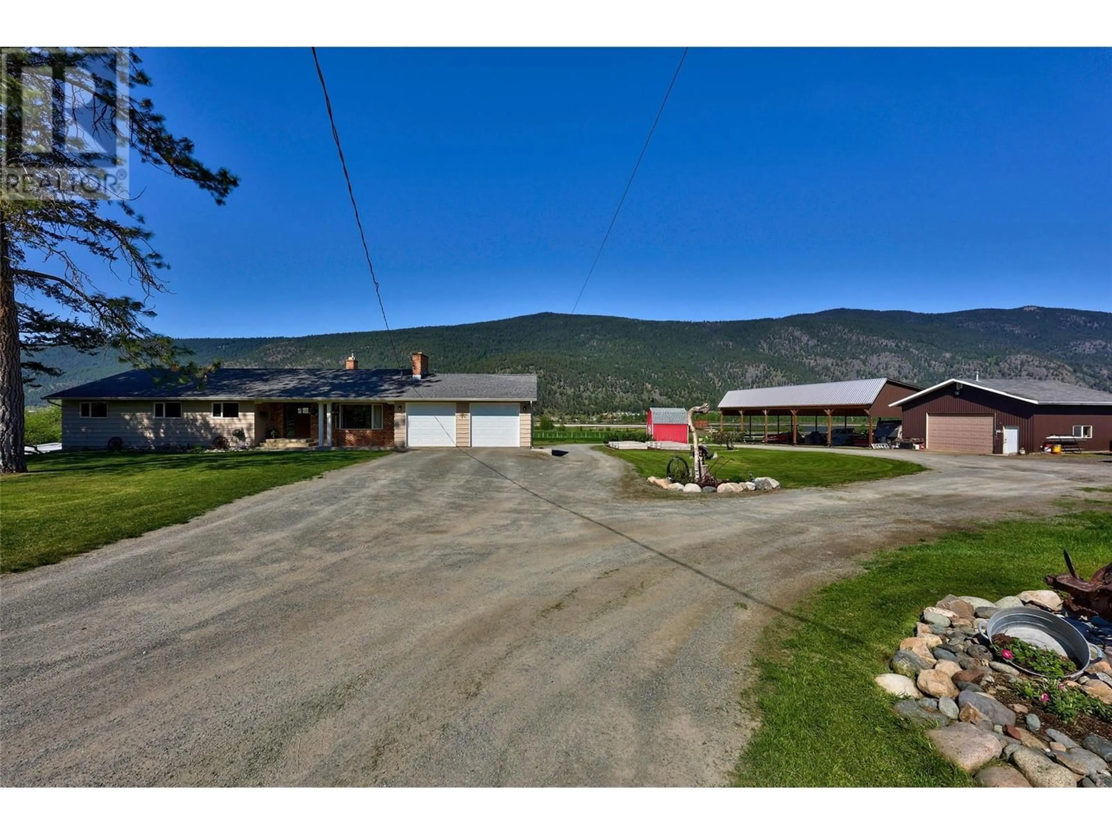 A pic from outside/outdoor area/front of a property/back of a property/a pic from drone, mountain view for 8517 COLT ROAD, Kamloops British Columbia V0E1Z0