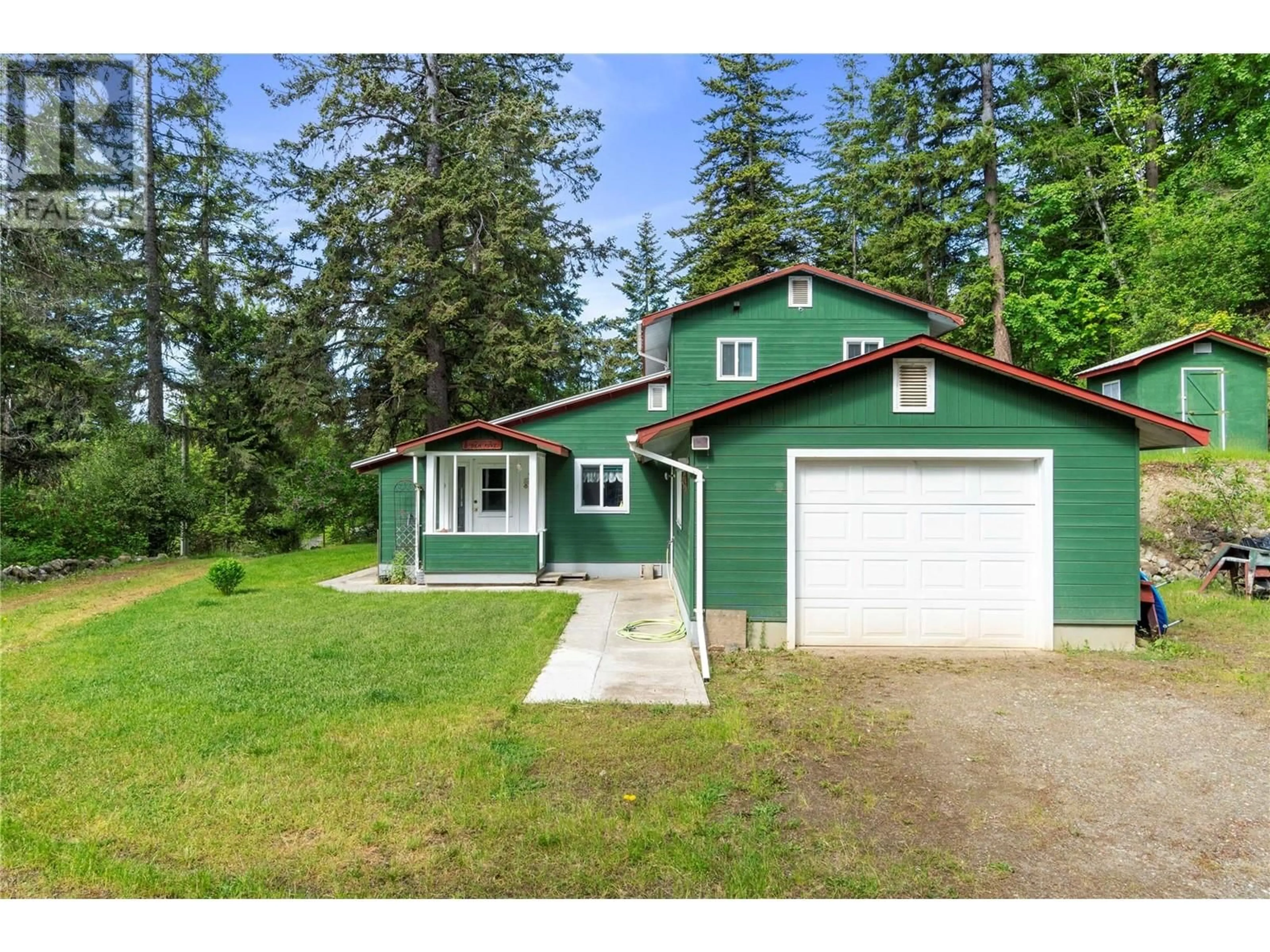 Home with vinyl exterior material, street for 6497 LINDSAY ROAD, Magna Bay British Columbia V0E1M7