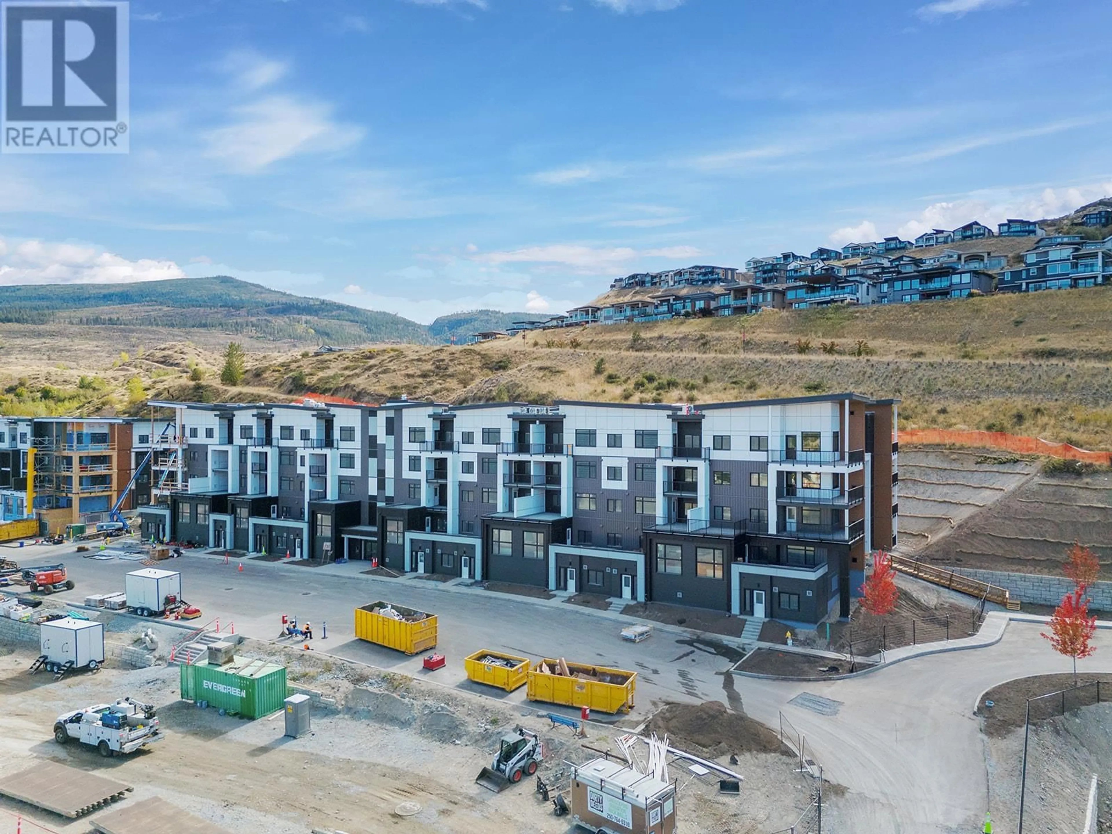 A pic from outside/outdoor area/front of a property/back of a property/a pic from drone, mountain view for 301 - 1057 FROST ROAD, Kelowna British Columbia V1W0G7
