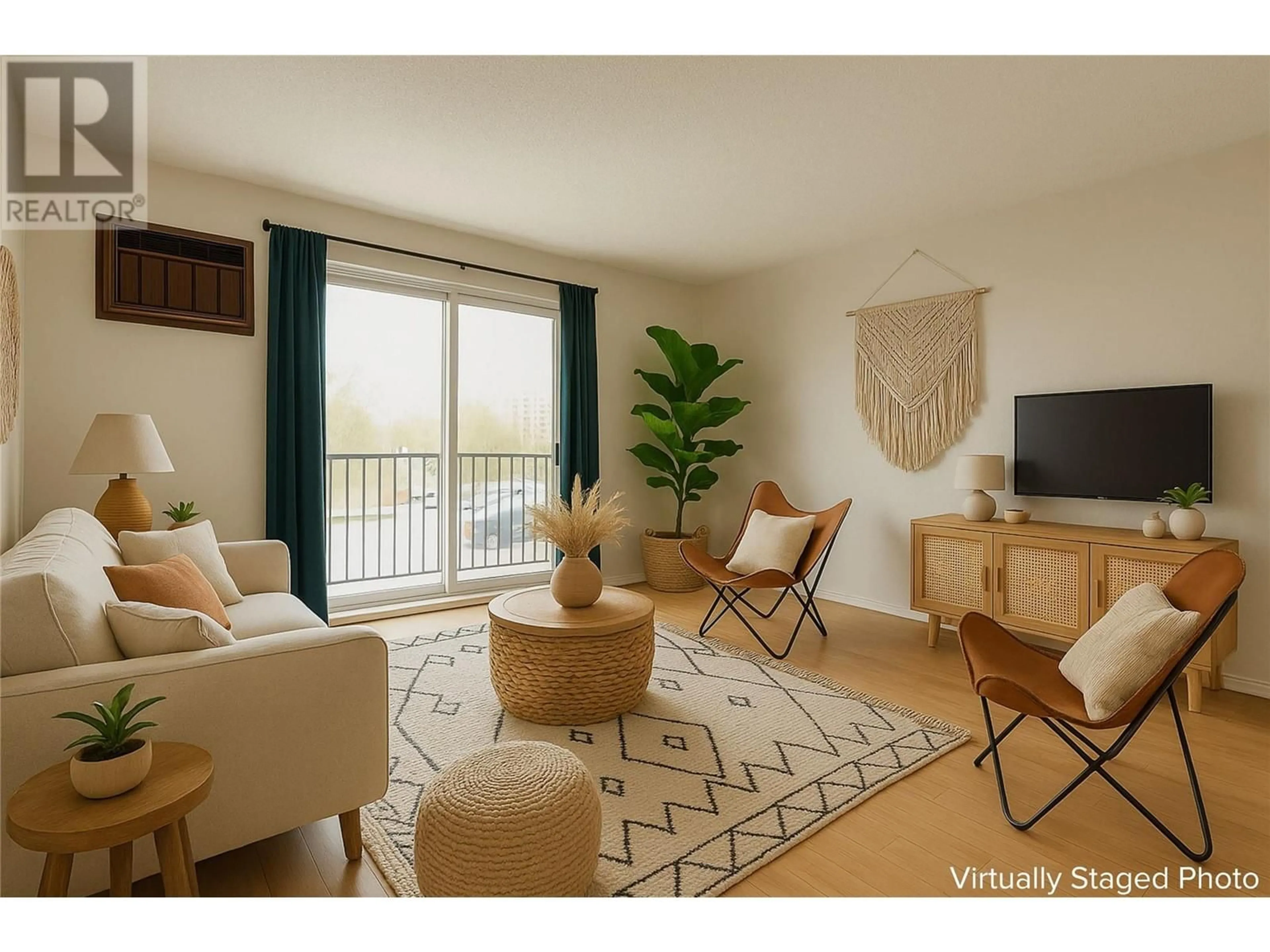 Living room with furniture, unknown for 206 - 130 SKAHA PLACE, Penticton British Columbia V2A7J6
