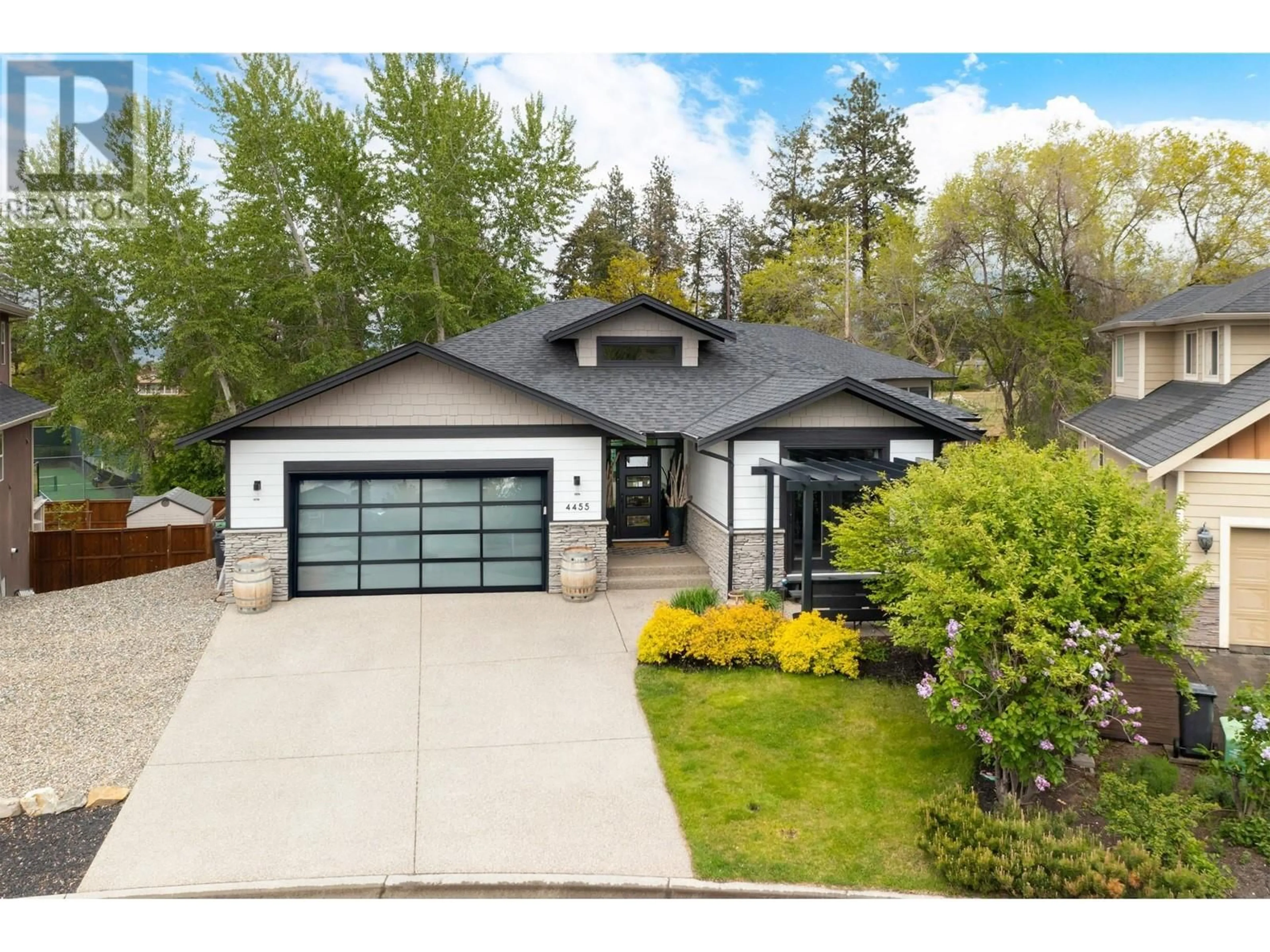 Home with vinyl exterior material, street for 4455 SHERWOOD COURT, Kelowna British Columbia V1W1E7