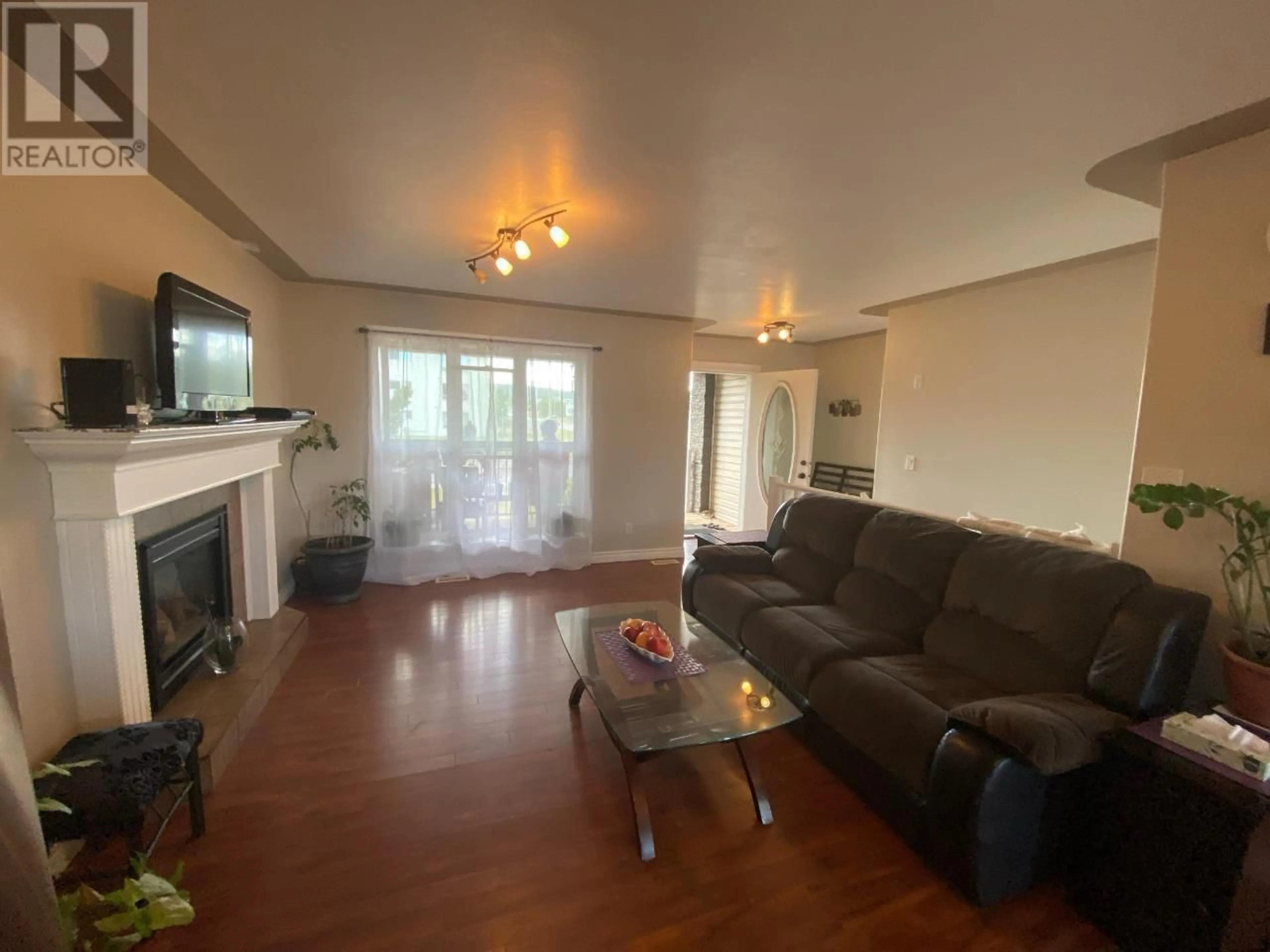 Living room with furniture, unknown for 1620 108 AVENUE, Dawson Creek British Columbia V1G2T6