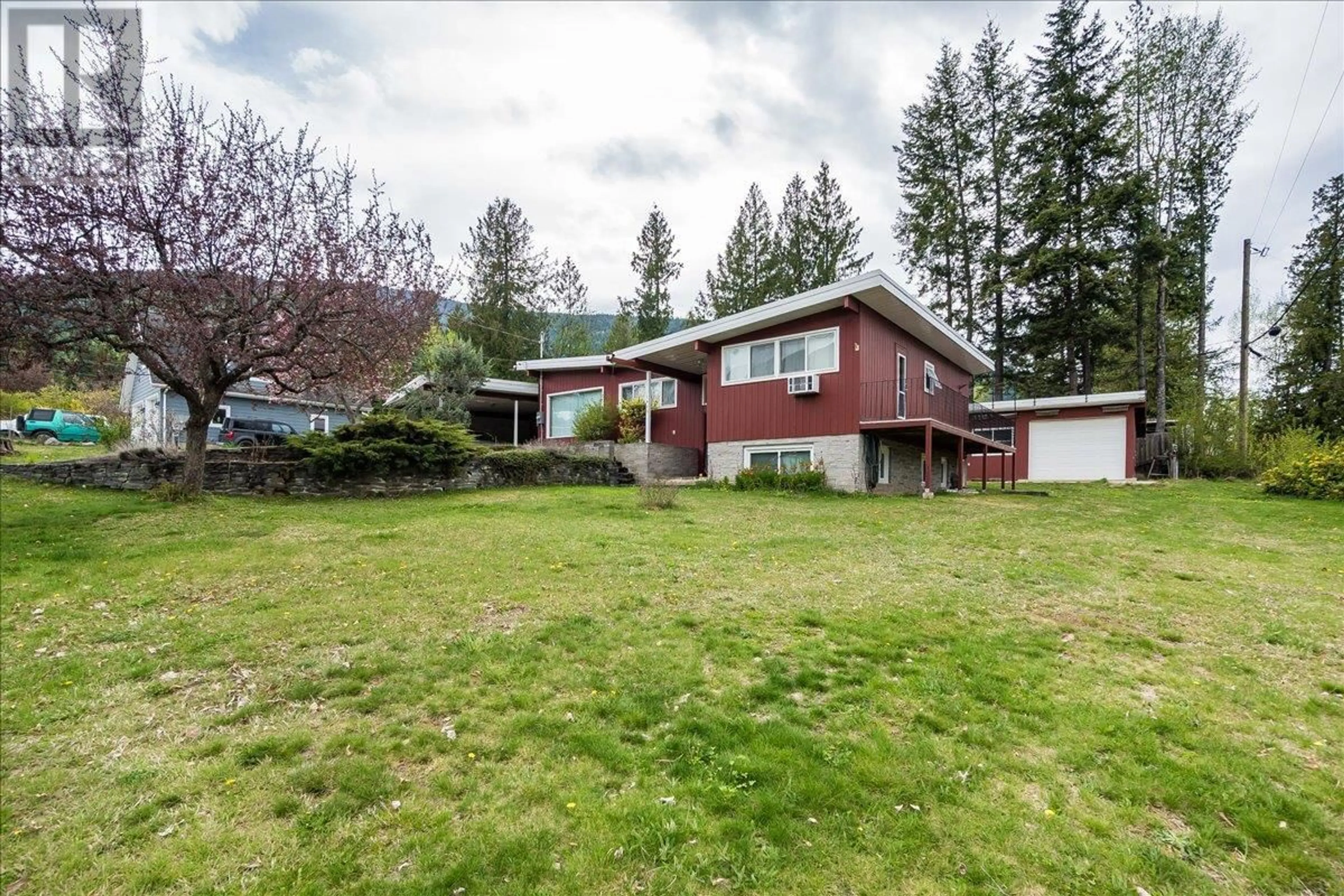 A pic from outside/outdoor area/front of a property/back of a property/a pic from drone, mountain view for 1402 CREASE AVENUE, Nelson British Columbia V1L1A2