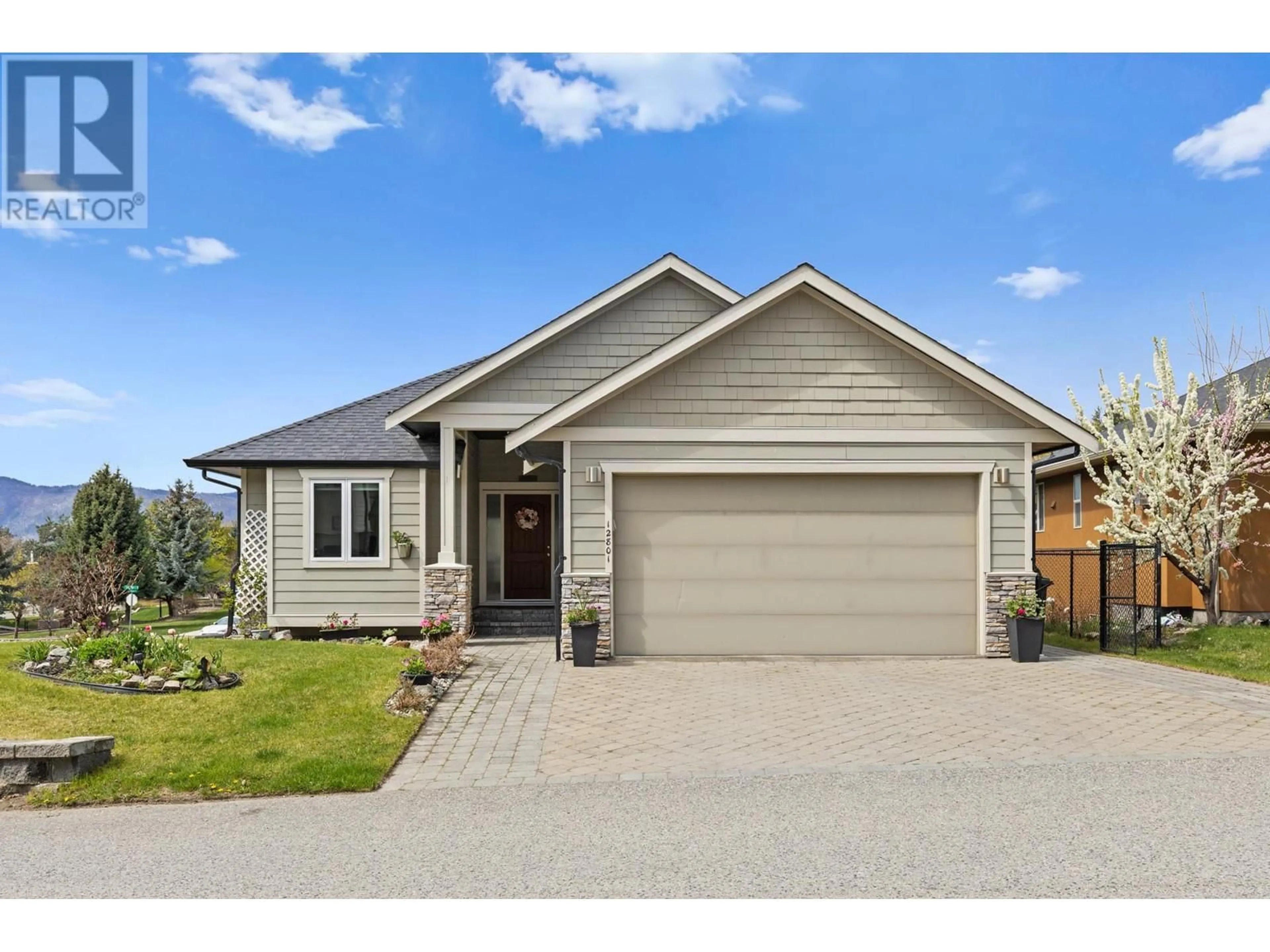 Home with vinyl exterior material, street for 12801 LAKE HILL DRIVE, Lake Country British Columbia V4V2P7