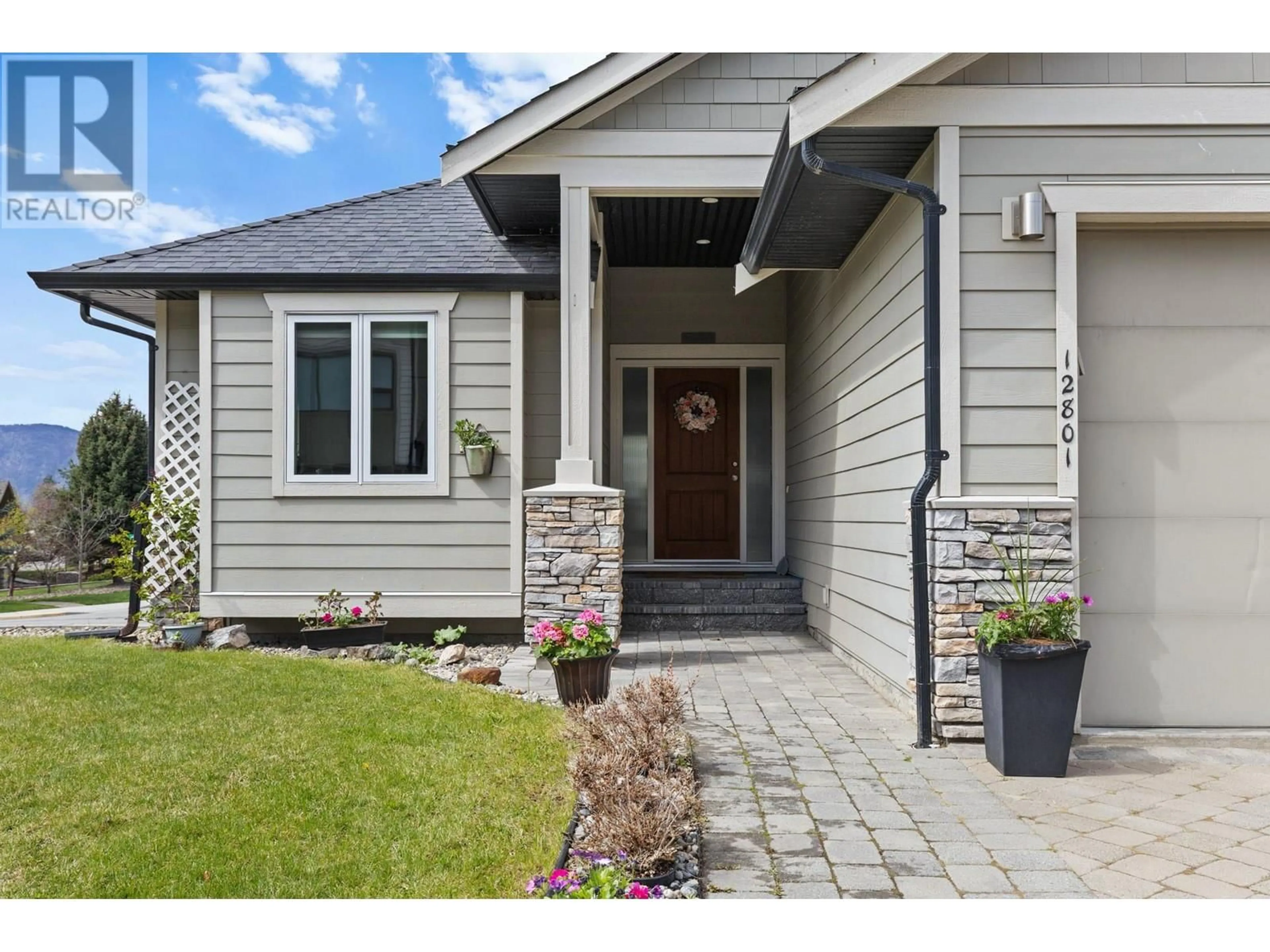 Home with vinyl exterior material, street for 12801 LAKE HILL DRIVE, Lake Country British Columbia V4V2P7