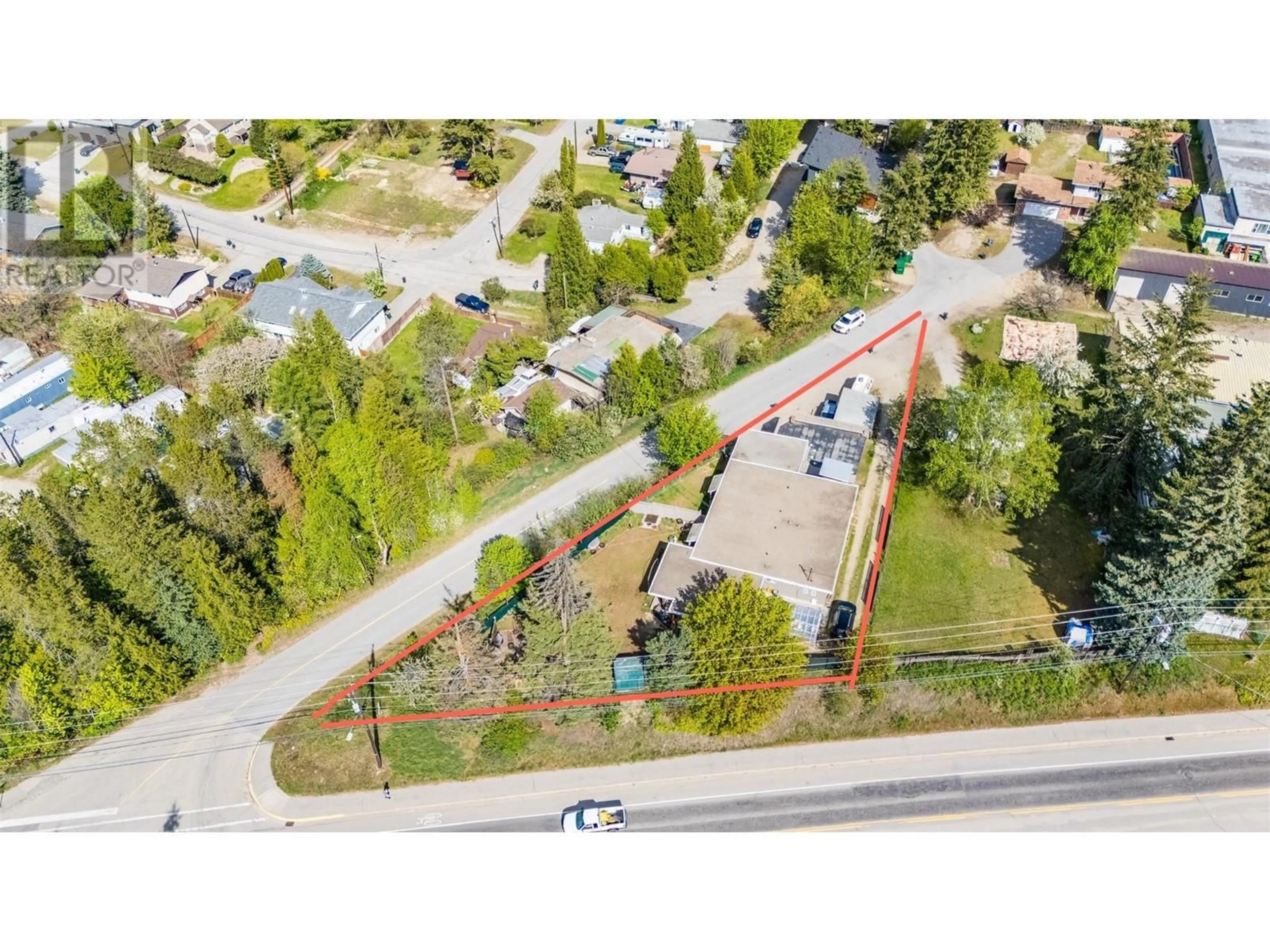 A pic from outside/outdoor area/front of a property/back of a property/a pic from drone, street for 714 12TH STREET, Castlegar British Columbia V1N2K3
