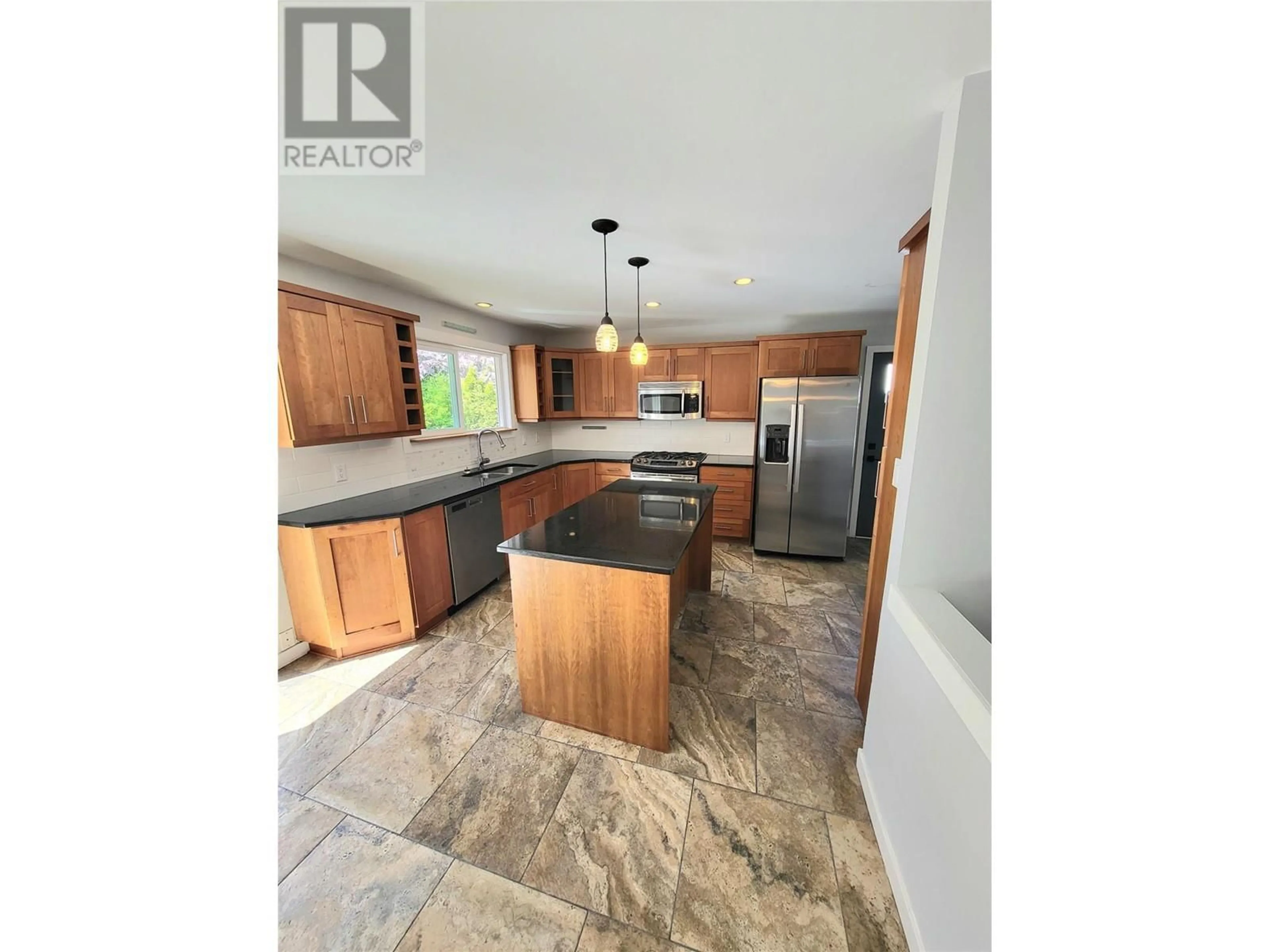 Open concept kitchen, unknown for 126 ANDREW PLACE, Penticton British Columbia V2A8S8