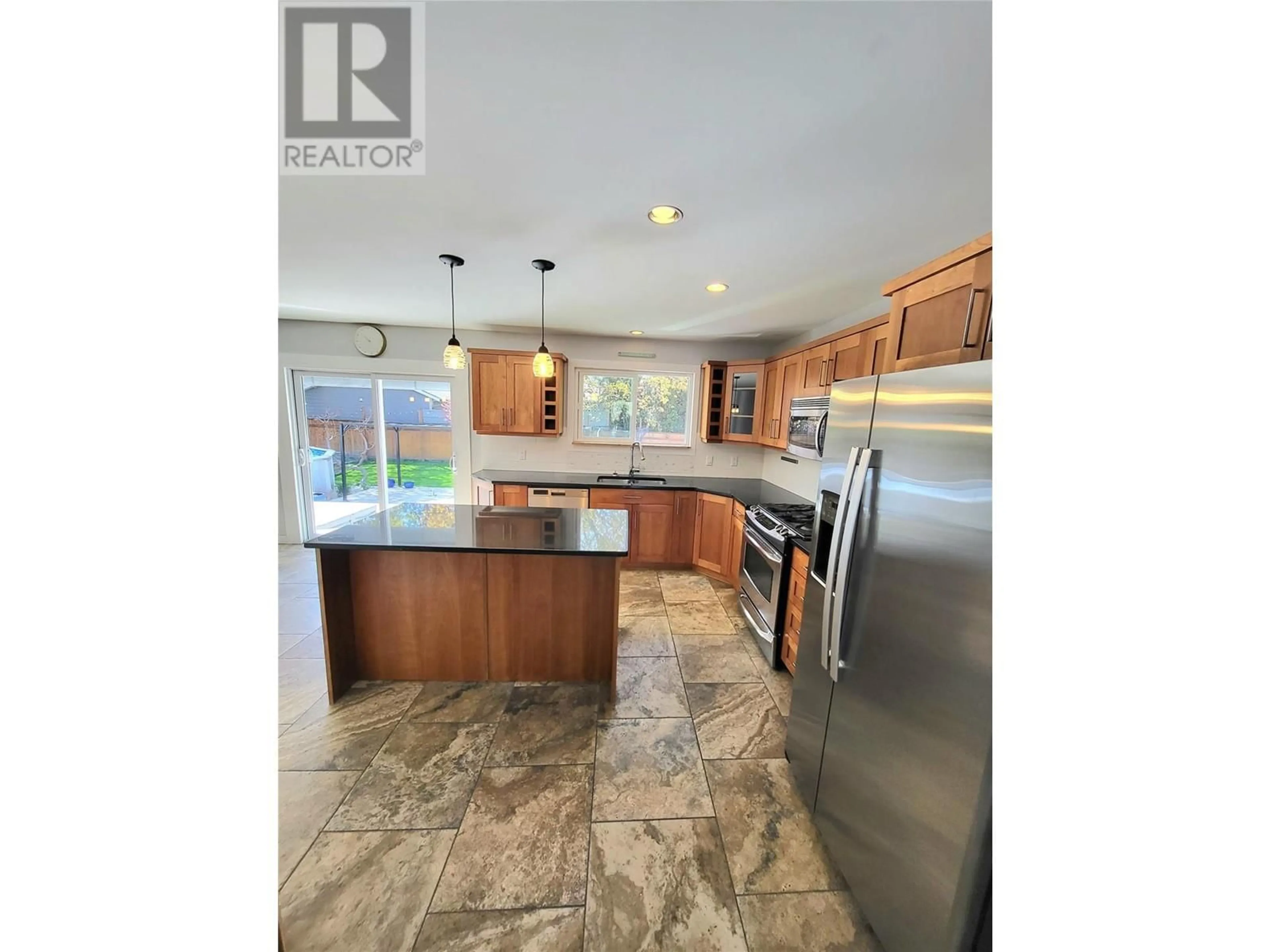 Open concept kitchen, ceramic/tile floor for 126 ANDREW PLACE, Penticton British Columbia V2A8S8